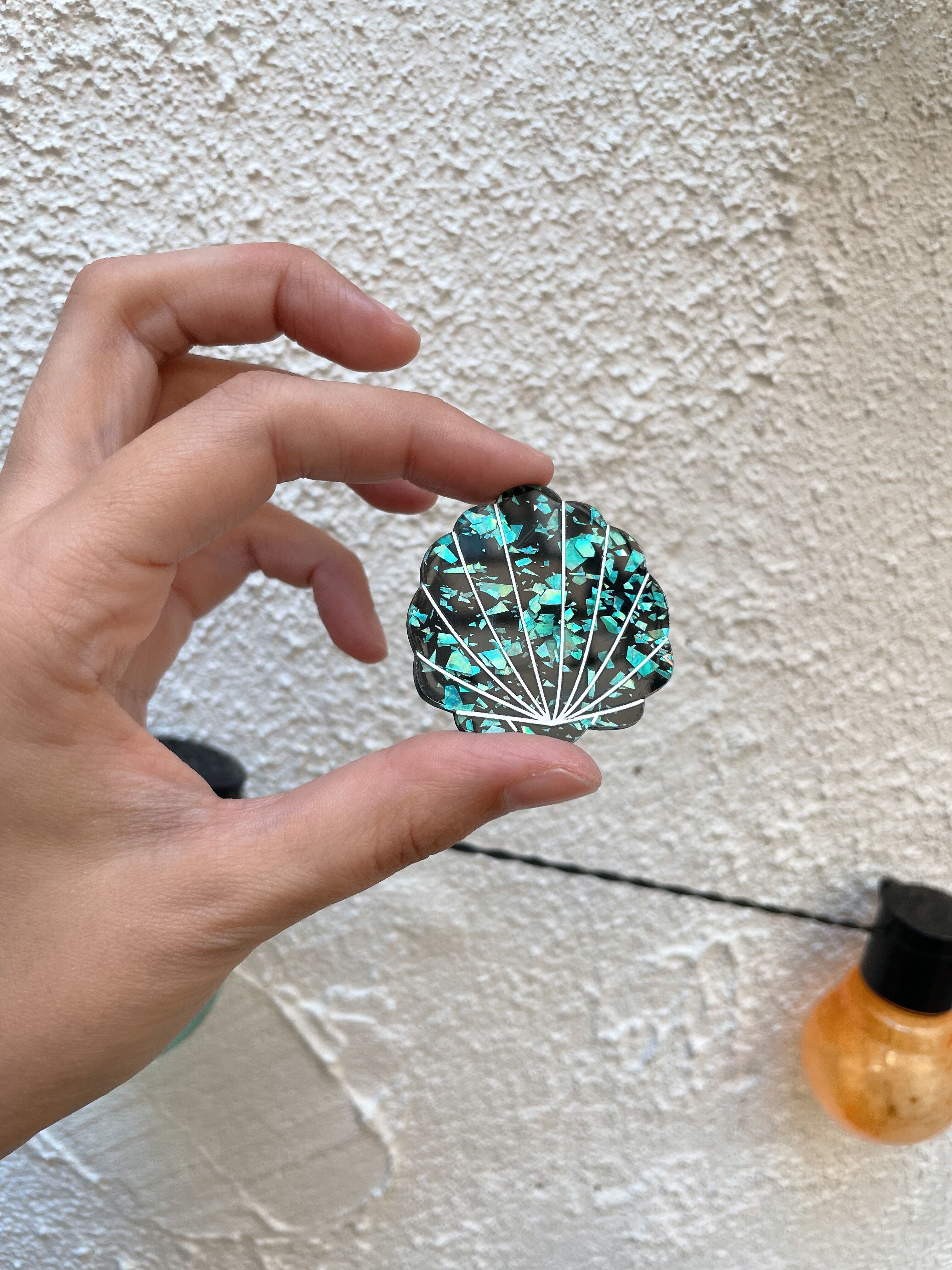 Plexiglass shell brooch with sequins