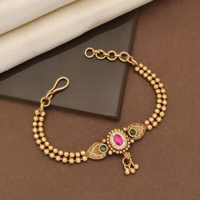 Traditionelles Messingarmband mit rosa Stein-Mittelstück
