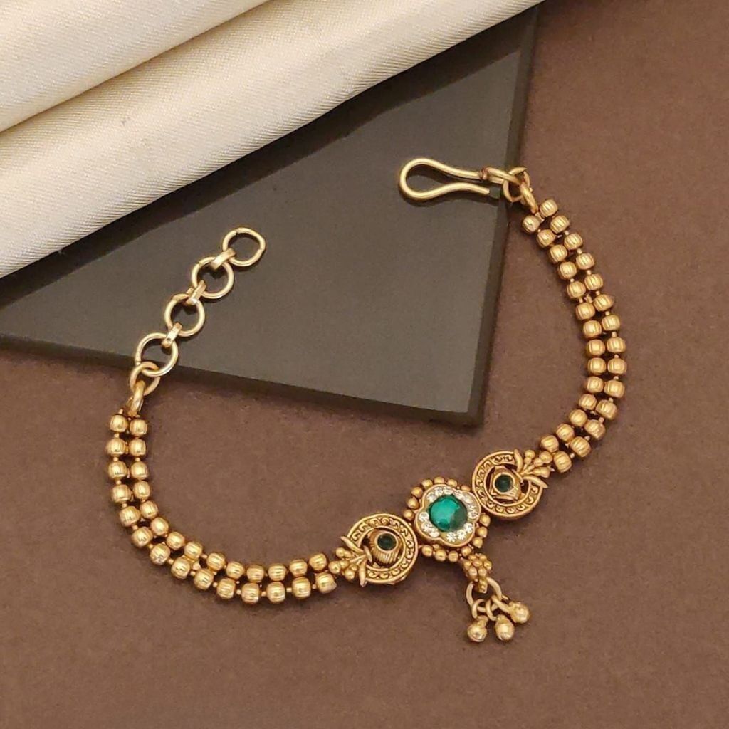 Traditional Brass Bracelet with Green Stone Centerpiece