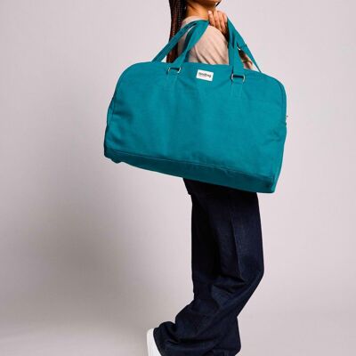 Bolso de viaje con diseño de pavo real de Yves Bleu