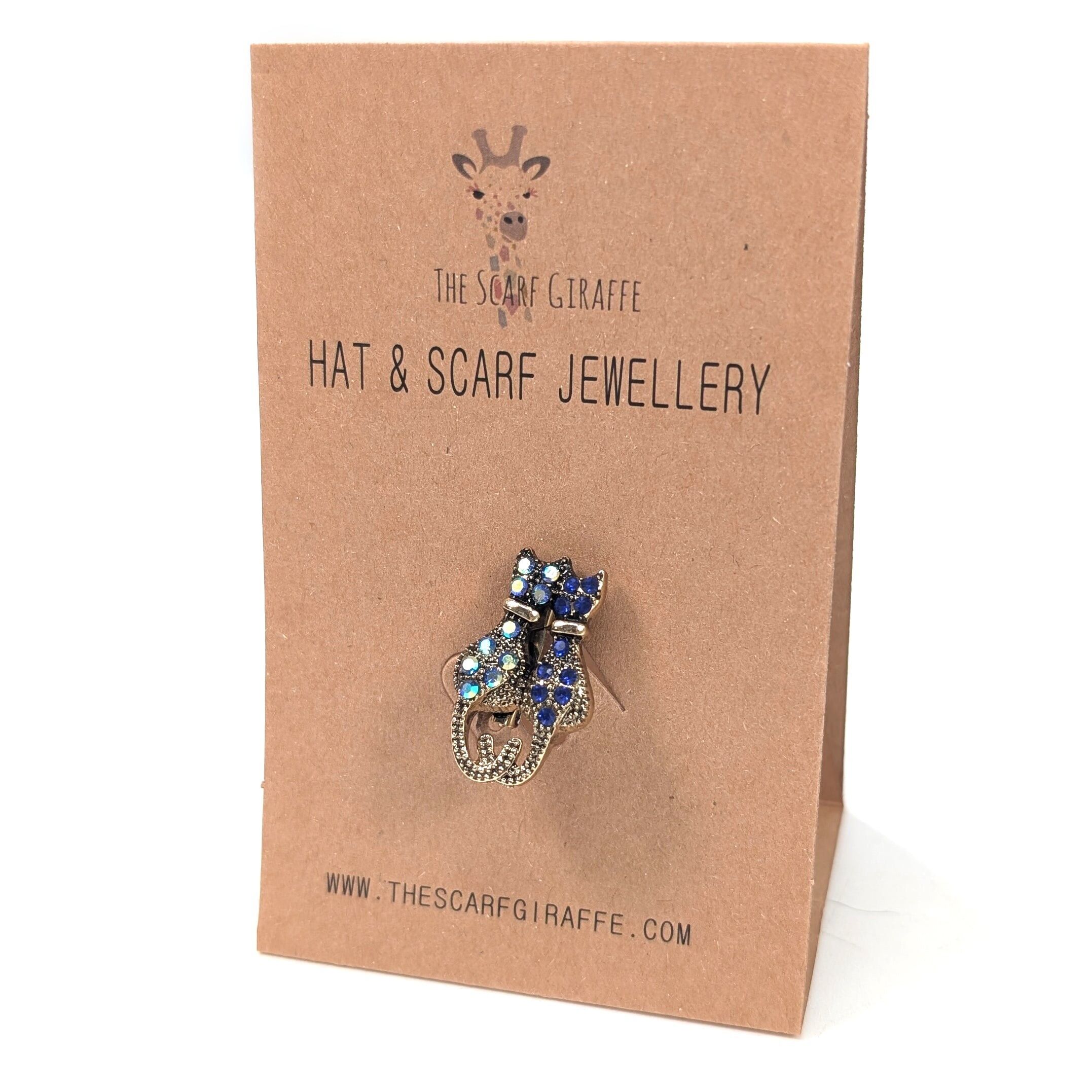 Cappello e sciarpa su carta - Gatto blu