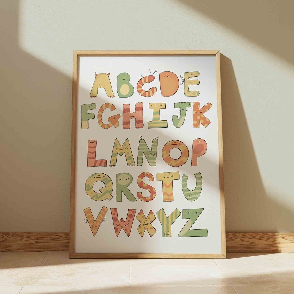 Stampa artistica dell'alfabeto a tema mostro carino per bambini