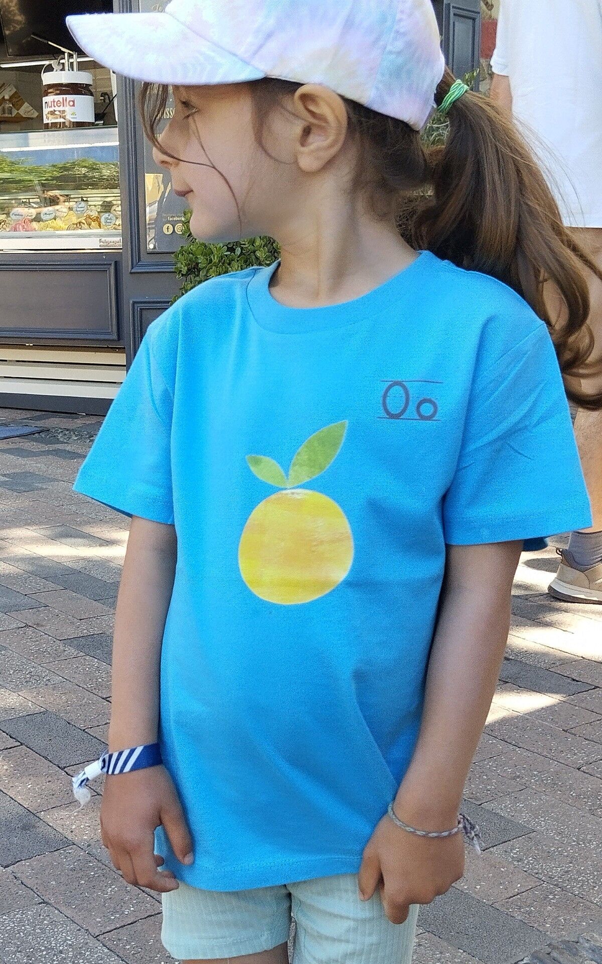 Maglietta in cotone biologico Meladi Kids - Arancione su blu acqua