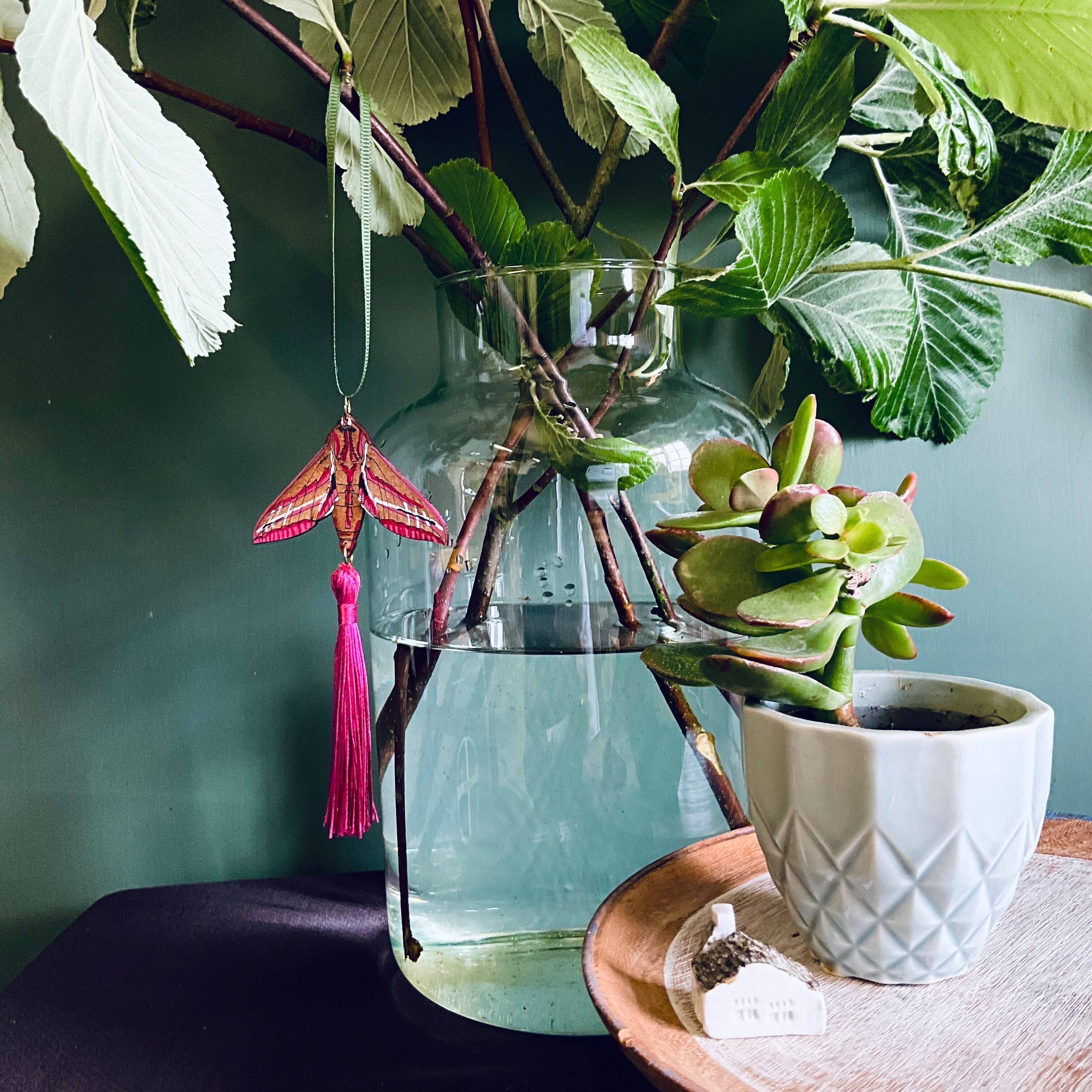 Décoration à pompon en forme de sphinx éléphant