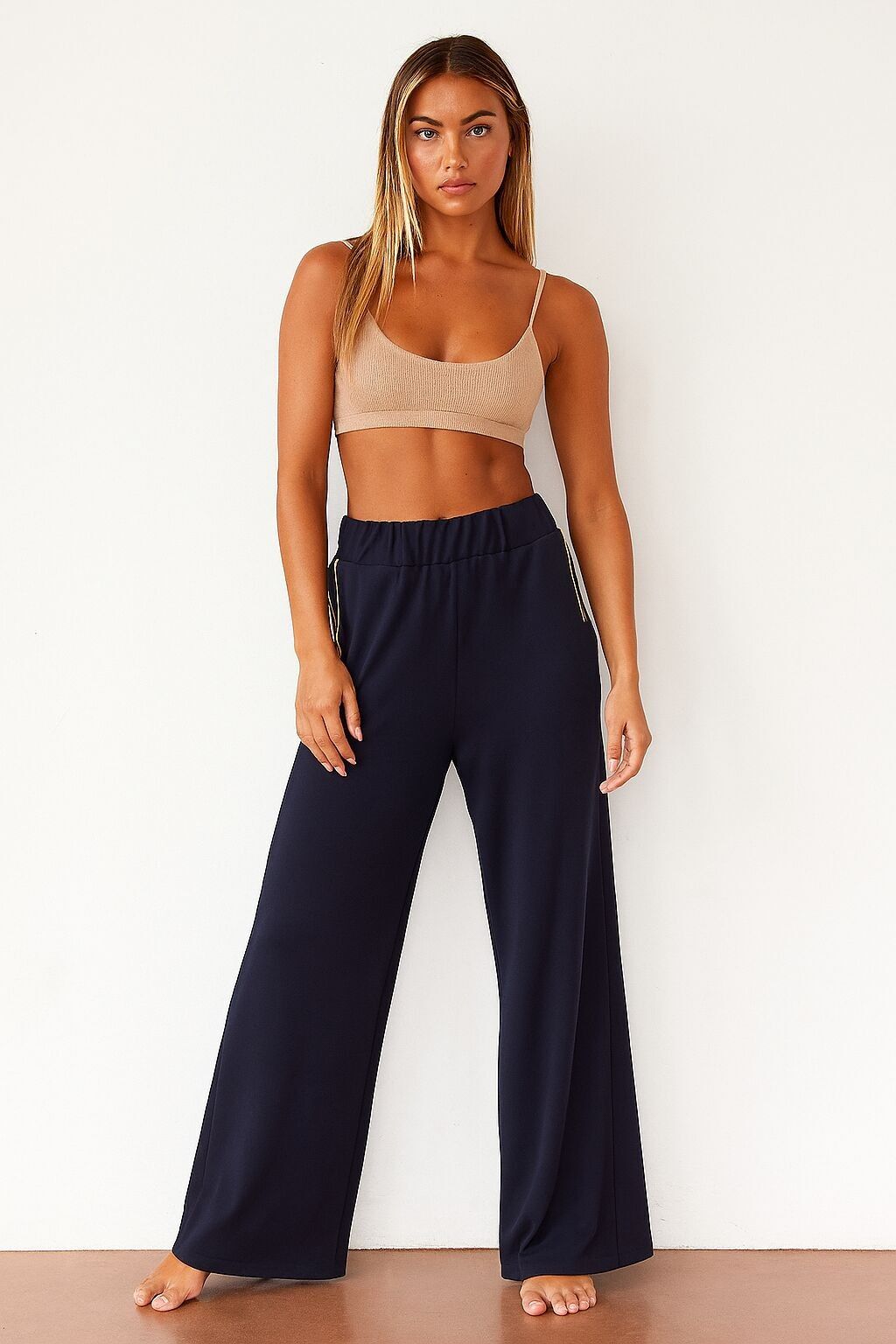 Pantaloni a gamba larga con tasche