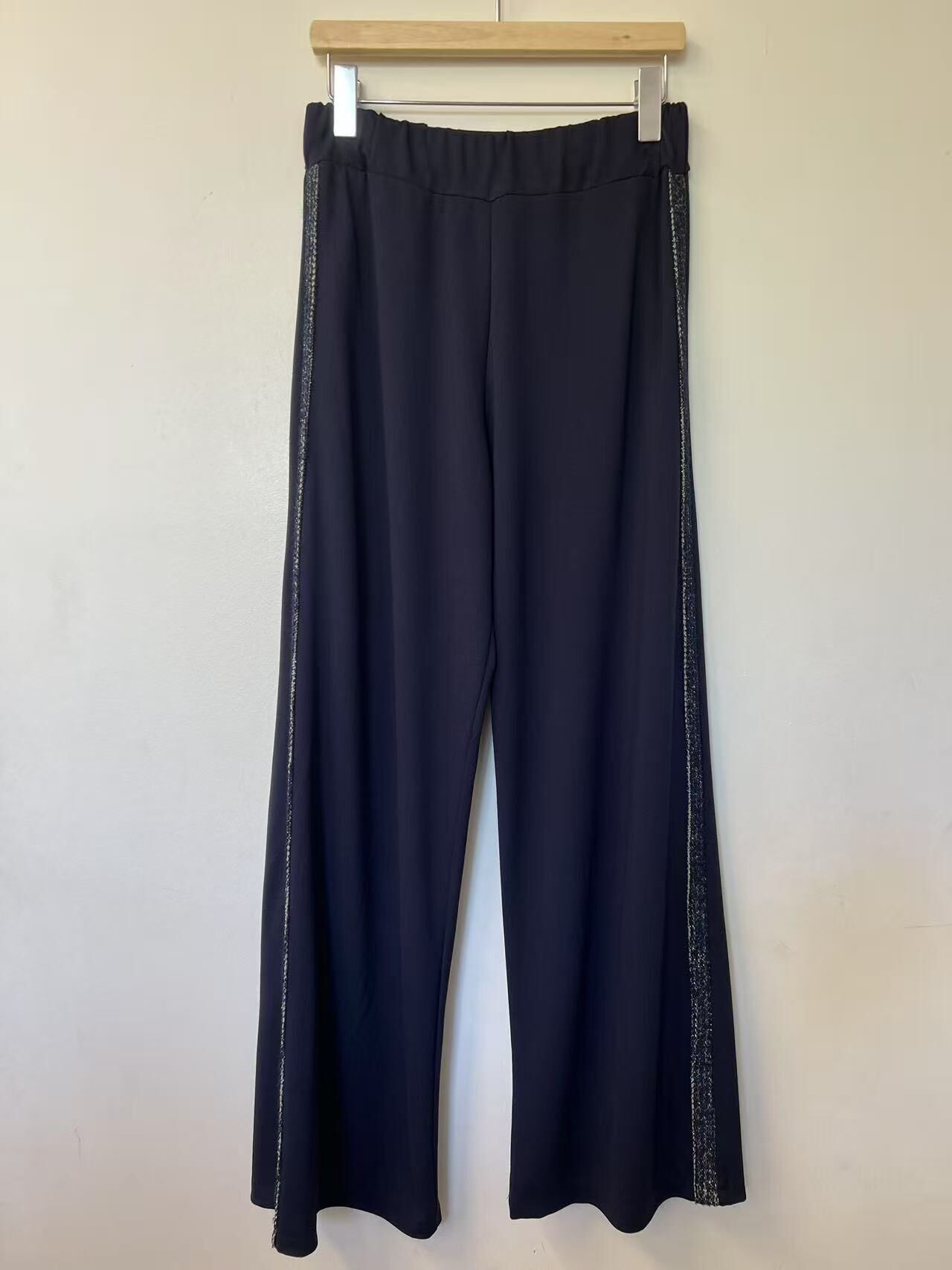 Pantaloni a gamba larga con dettagli glitterati