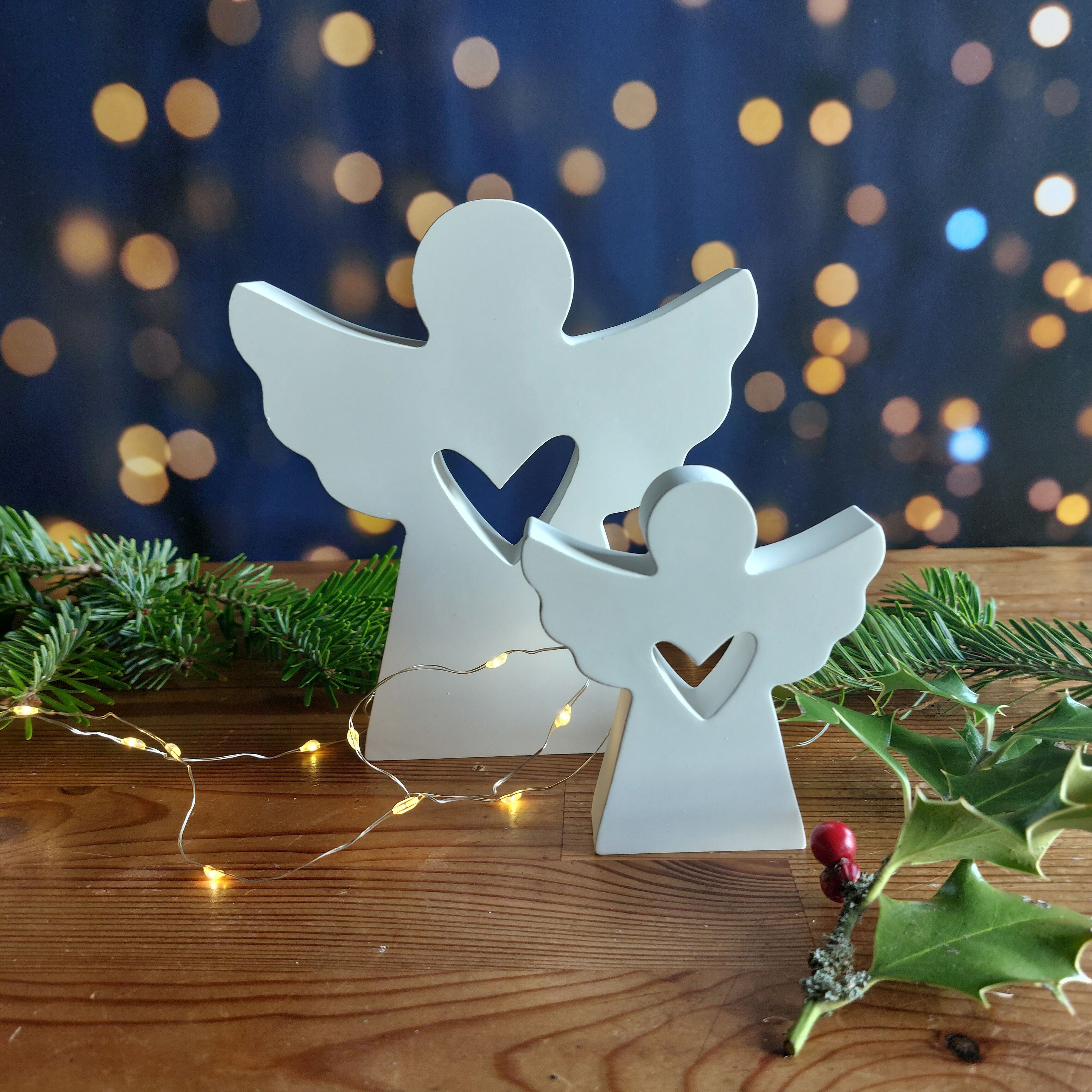 Minimalist and modern white Christmas angels, clean Christmas decoration