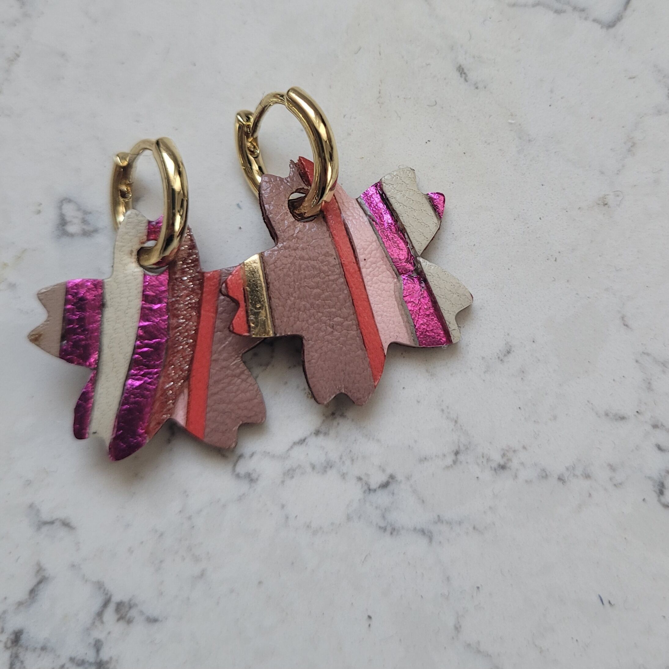 Gold-plated hoop earrings with fuchsia pink cherry blossom tassel