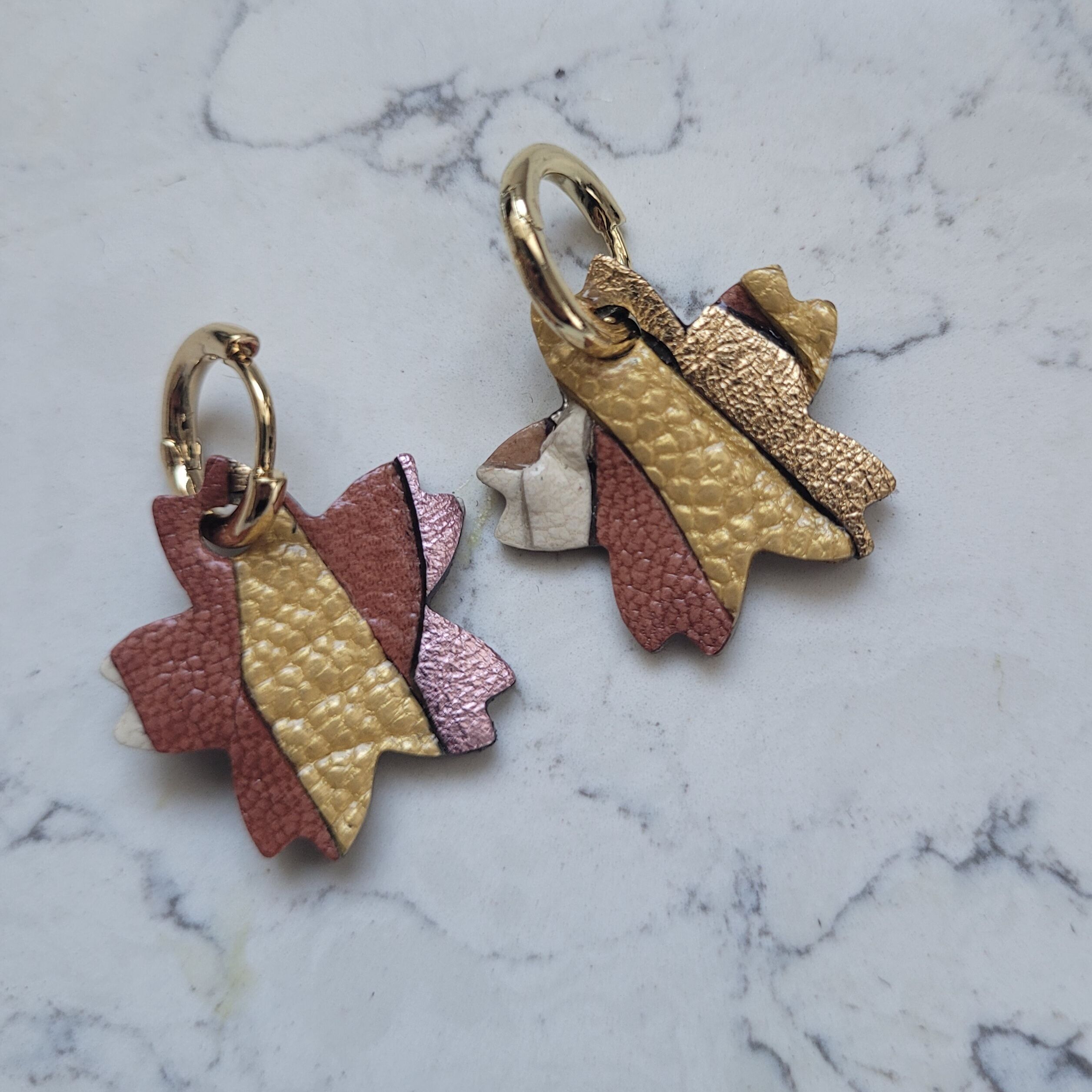 Gold-plated hoop earrings with pink and gold cherry blossom tassel