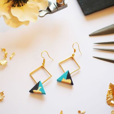 Golden diamond and ebony triangle earrings painted in sky blue, gold leaf