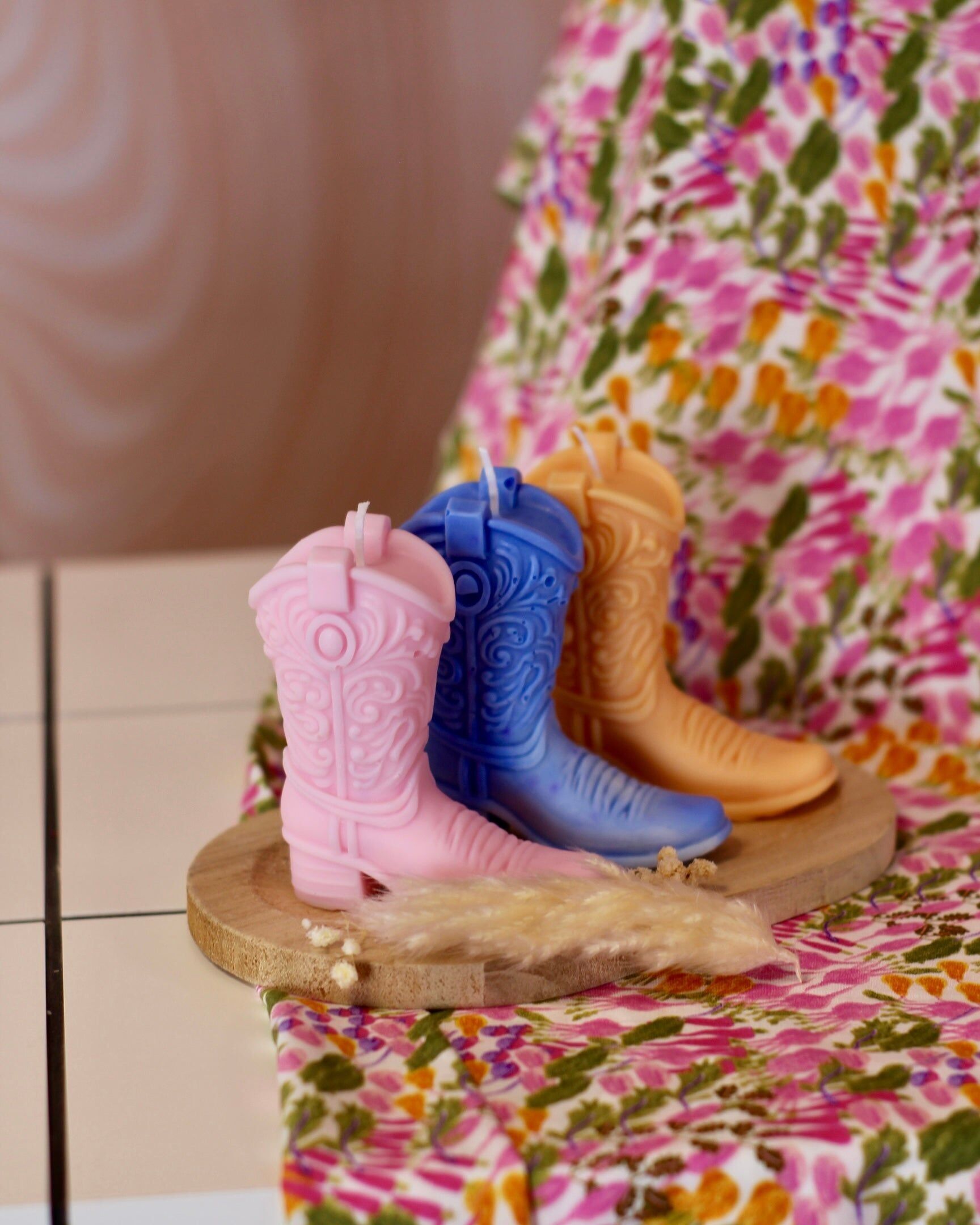 Candela a forma di stivale da cowboy