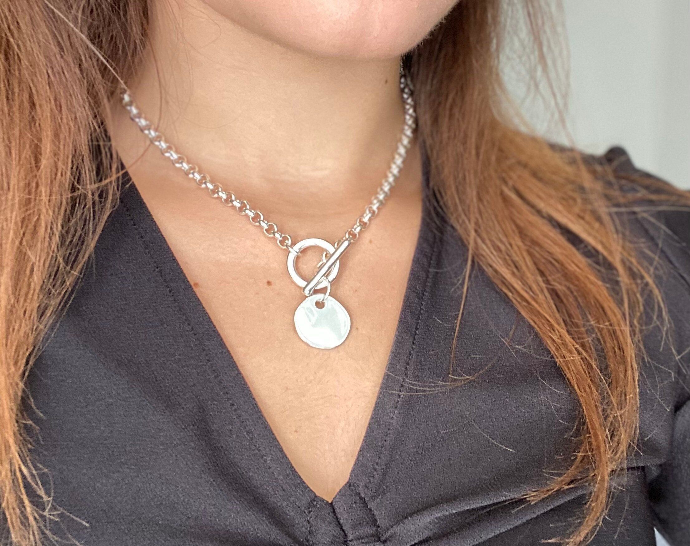 Collana con catena a ciondoli rotondi e chiusura a scatto