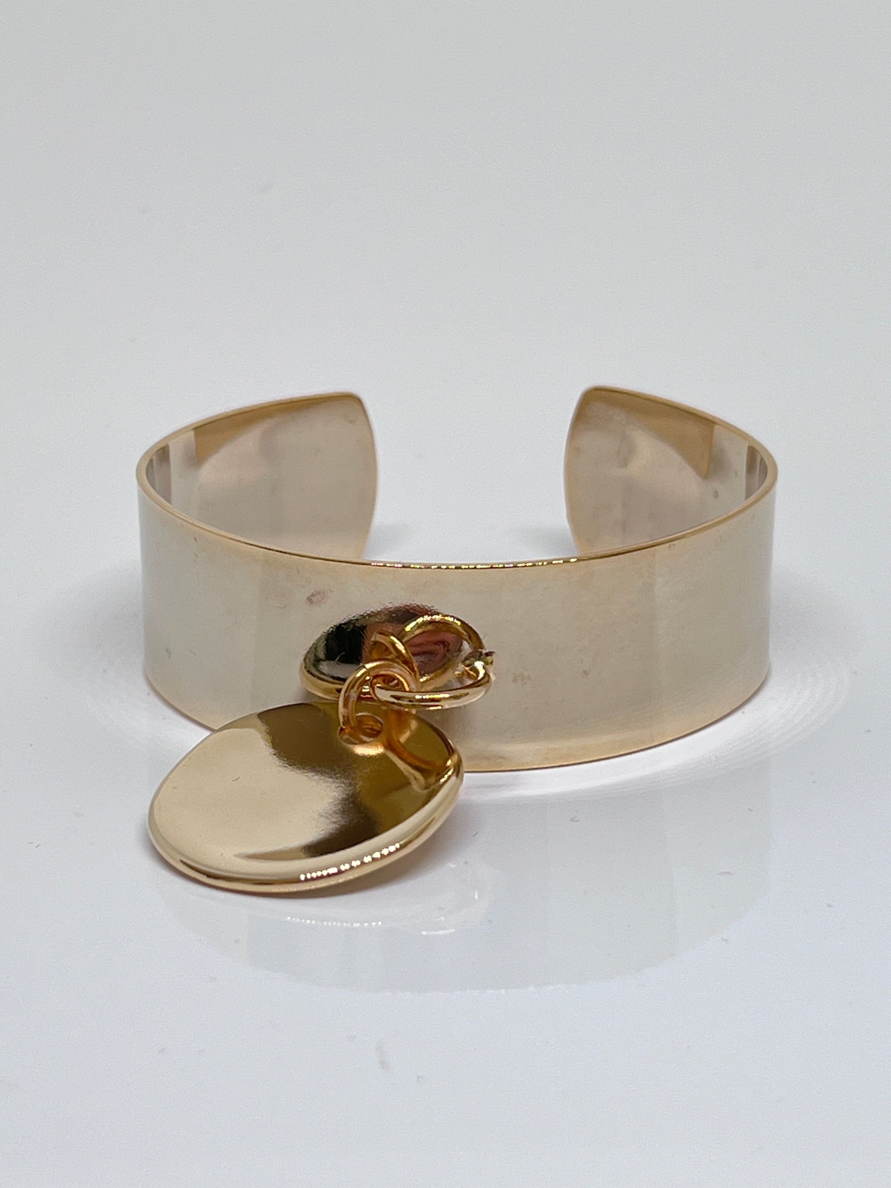 Bracciale e medaglia della Marina in oro