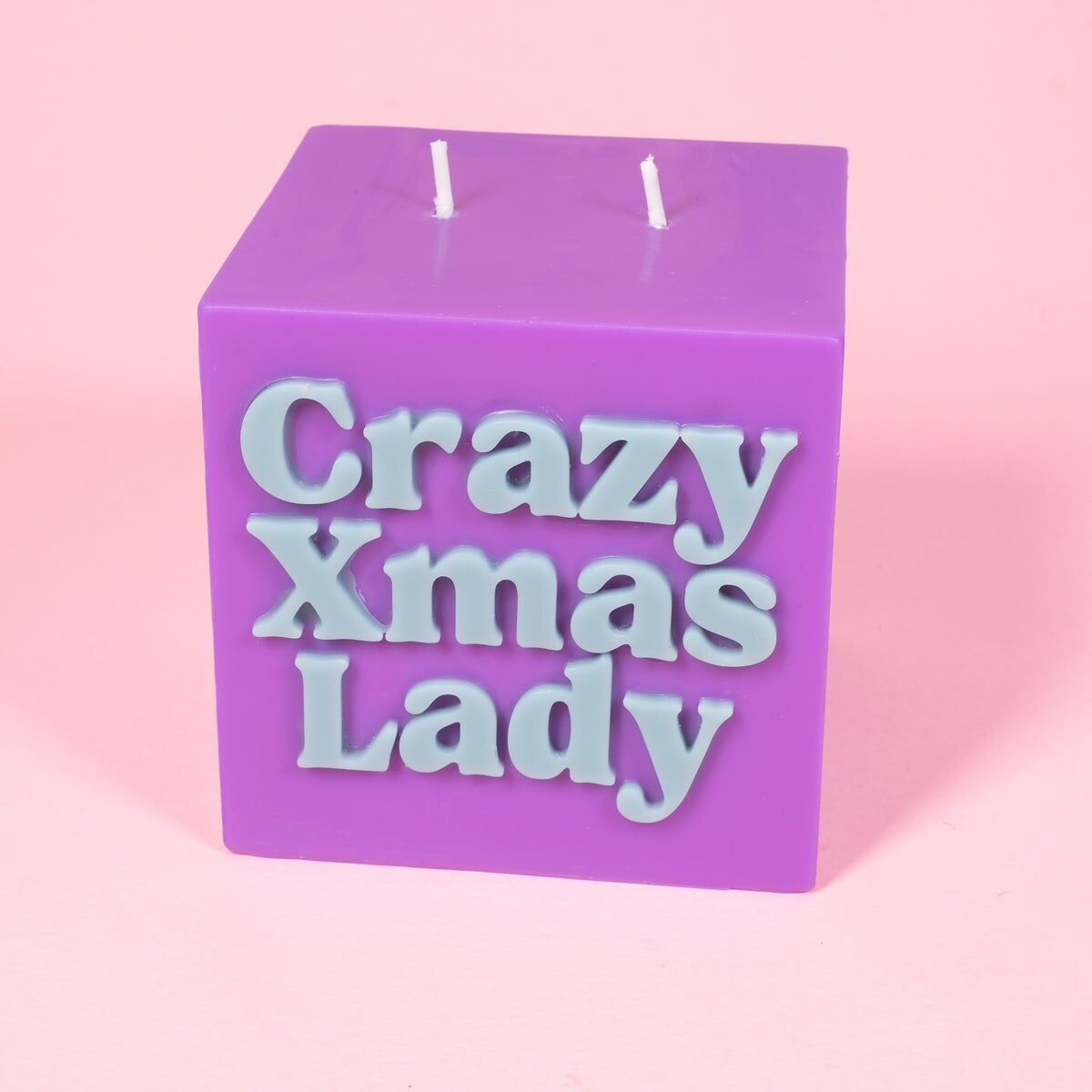 Vela cúbica navideña morada y verde azulado Crazy Xmas Lady
