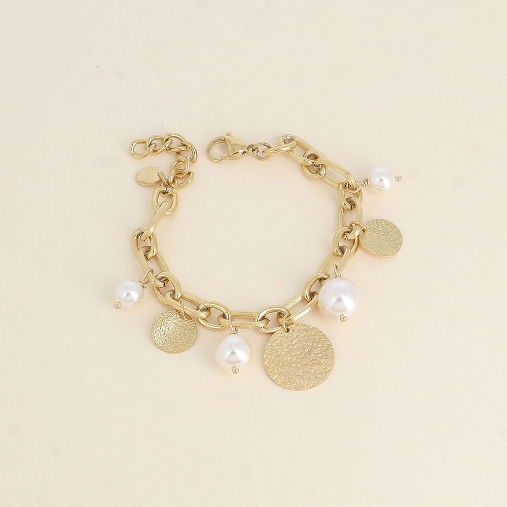 Armband – Harzperlen und strukturierte runde Quasten