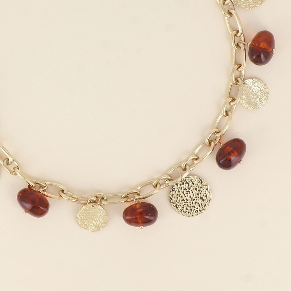 Halskette – Harzperlen und strukturierte runde Quasten