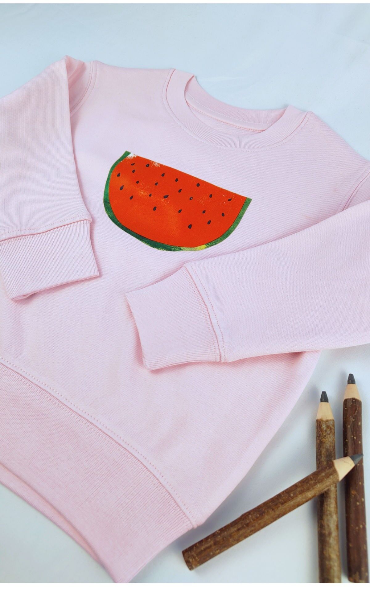 Maglione per bambini Meladi in cotone biologico - melone su rosa chiaro