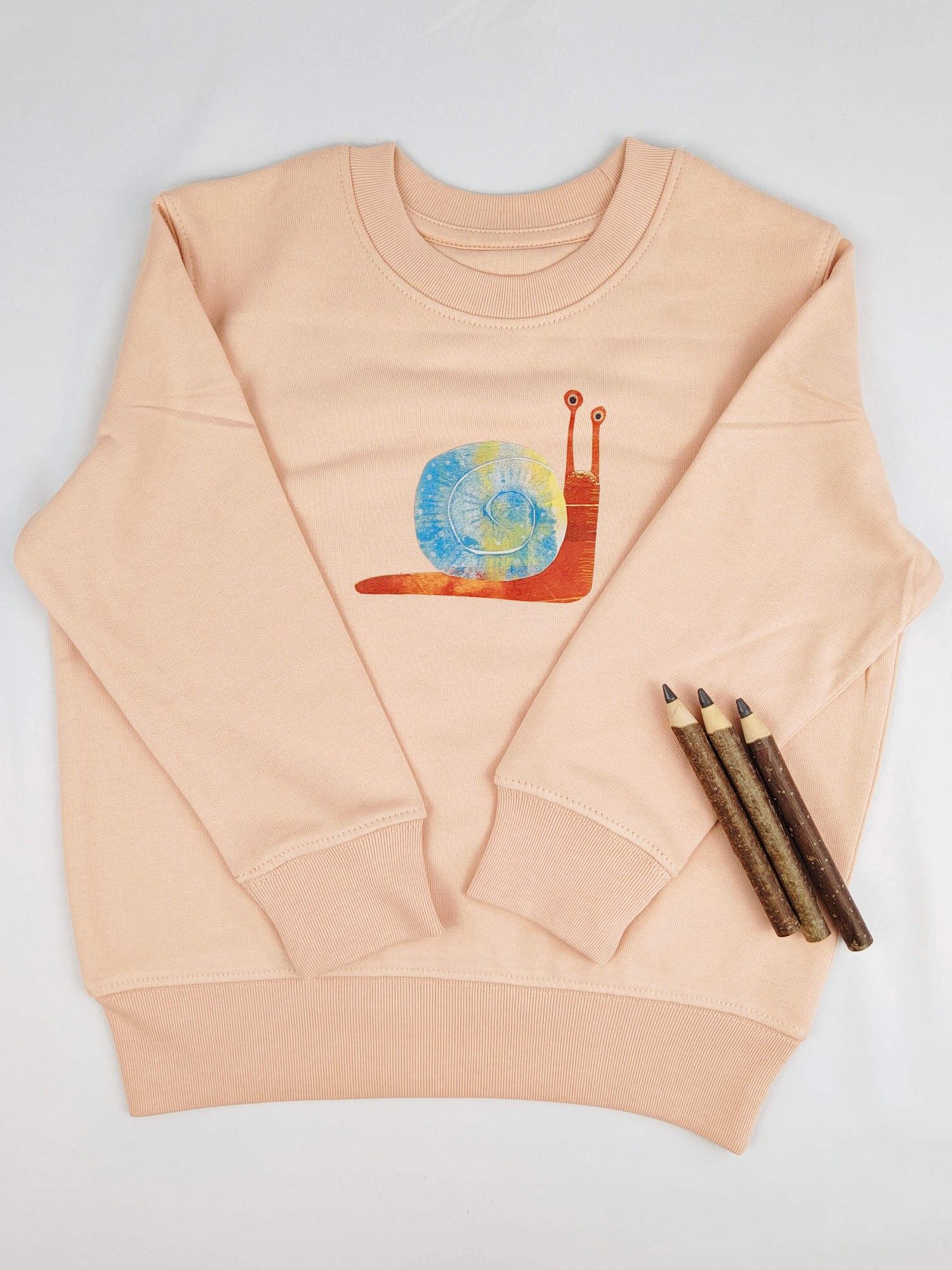 Maglione per bambini Meladi in cotone biologico - lumaca su crema latte