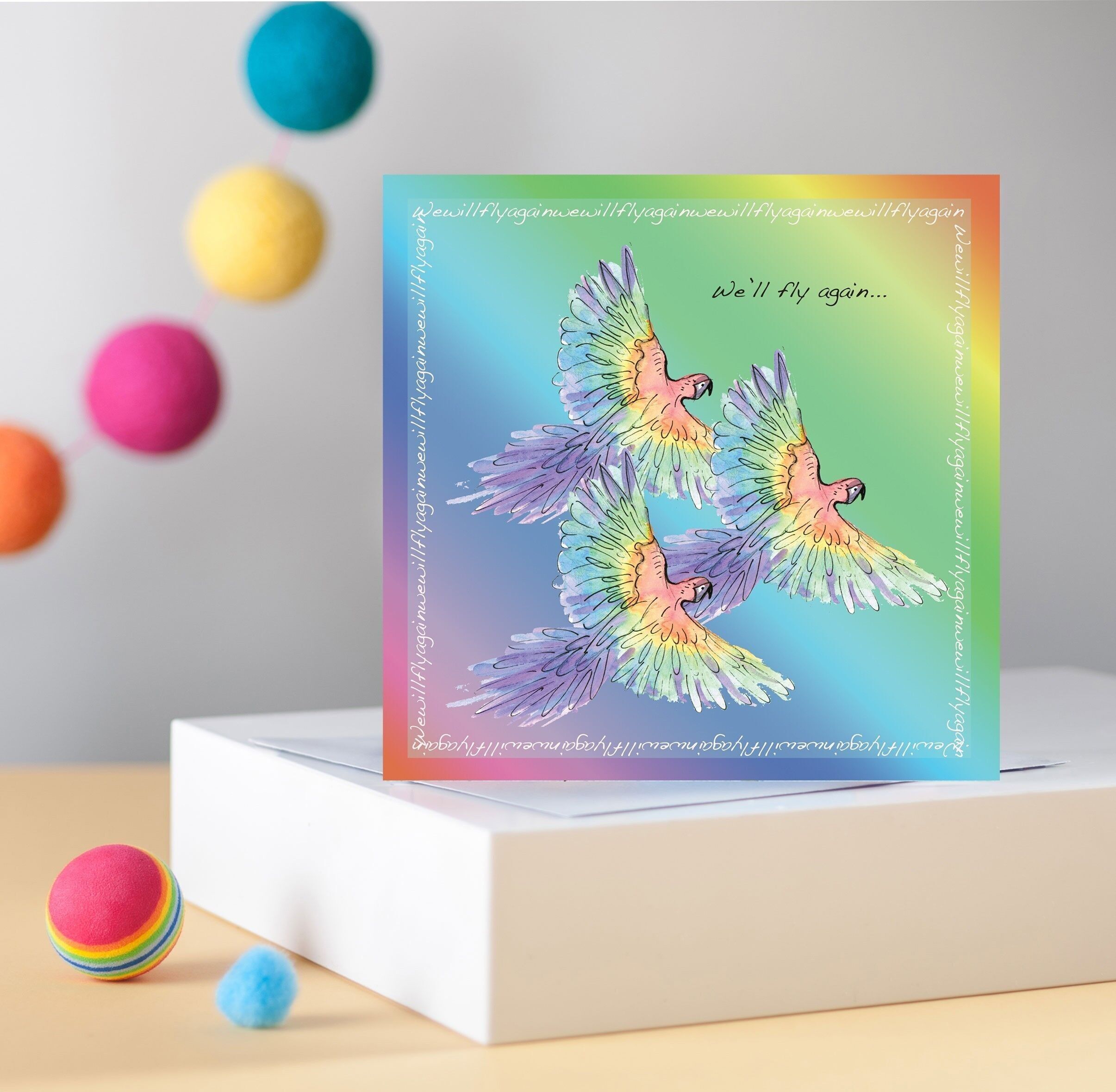 Tarjeta de felicitaciones de loros arcoiris