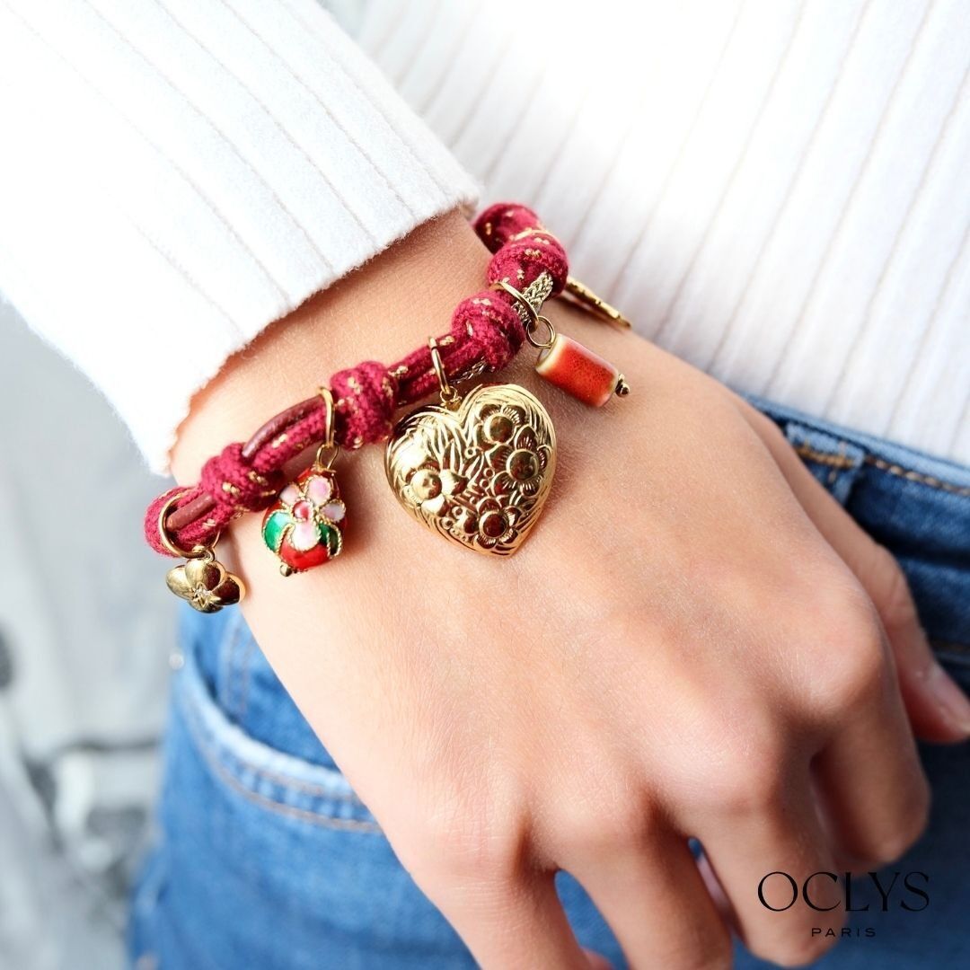 Duna gold stainless steel double cord bracelet with heart charms