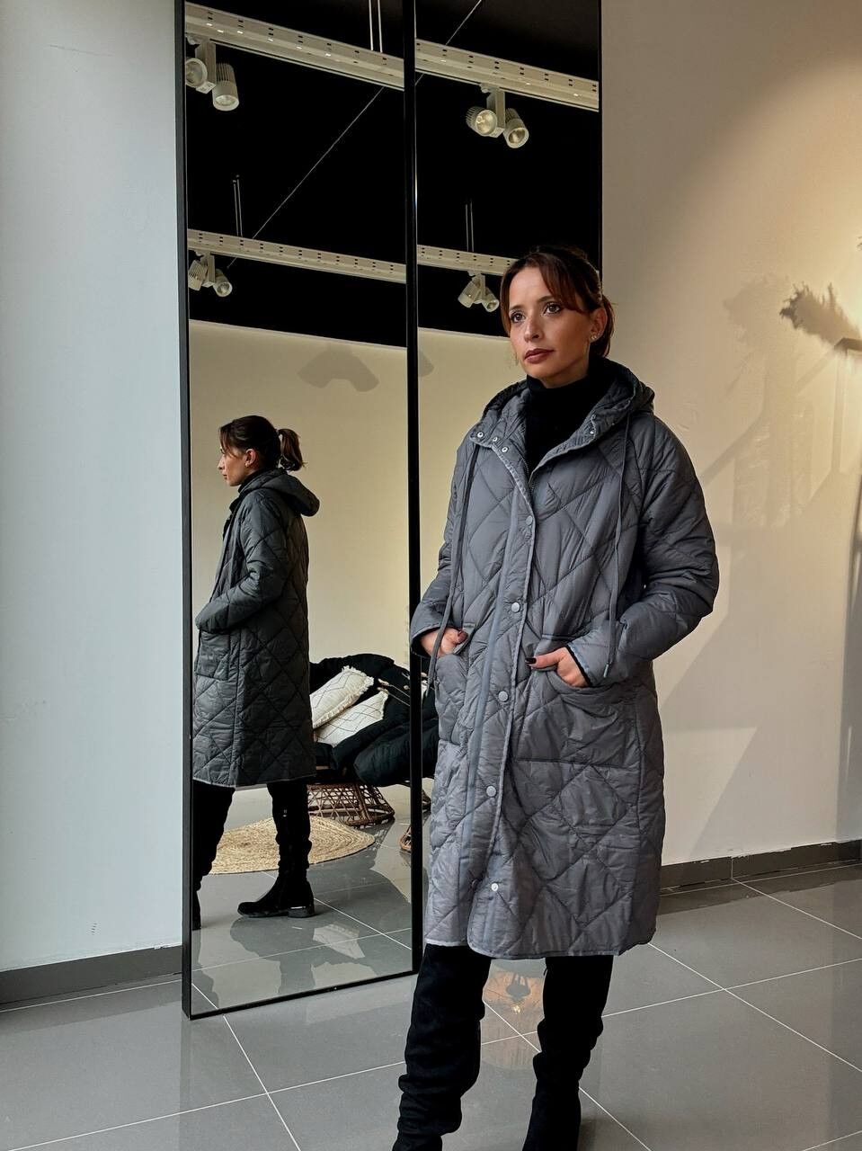 Long quilted coat with hood and side pockets - zipped and snap buttons