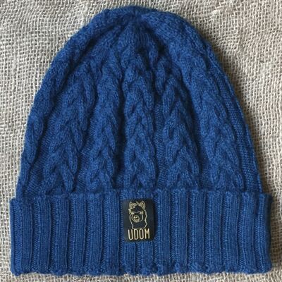 Bonnet ample en tricot torsadé – bleu