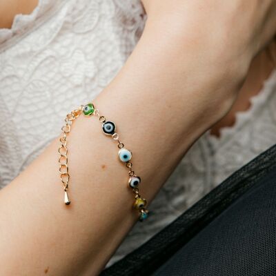 Pulsera multicolor con cuentas de arcoíris protectoras y amuleto turco contra el mal de ojo