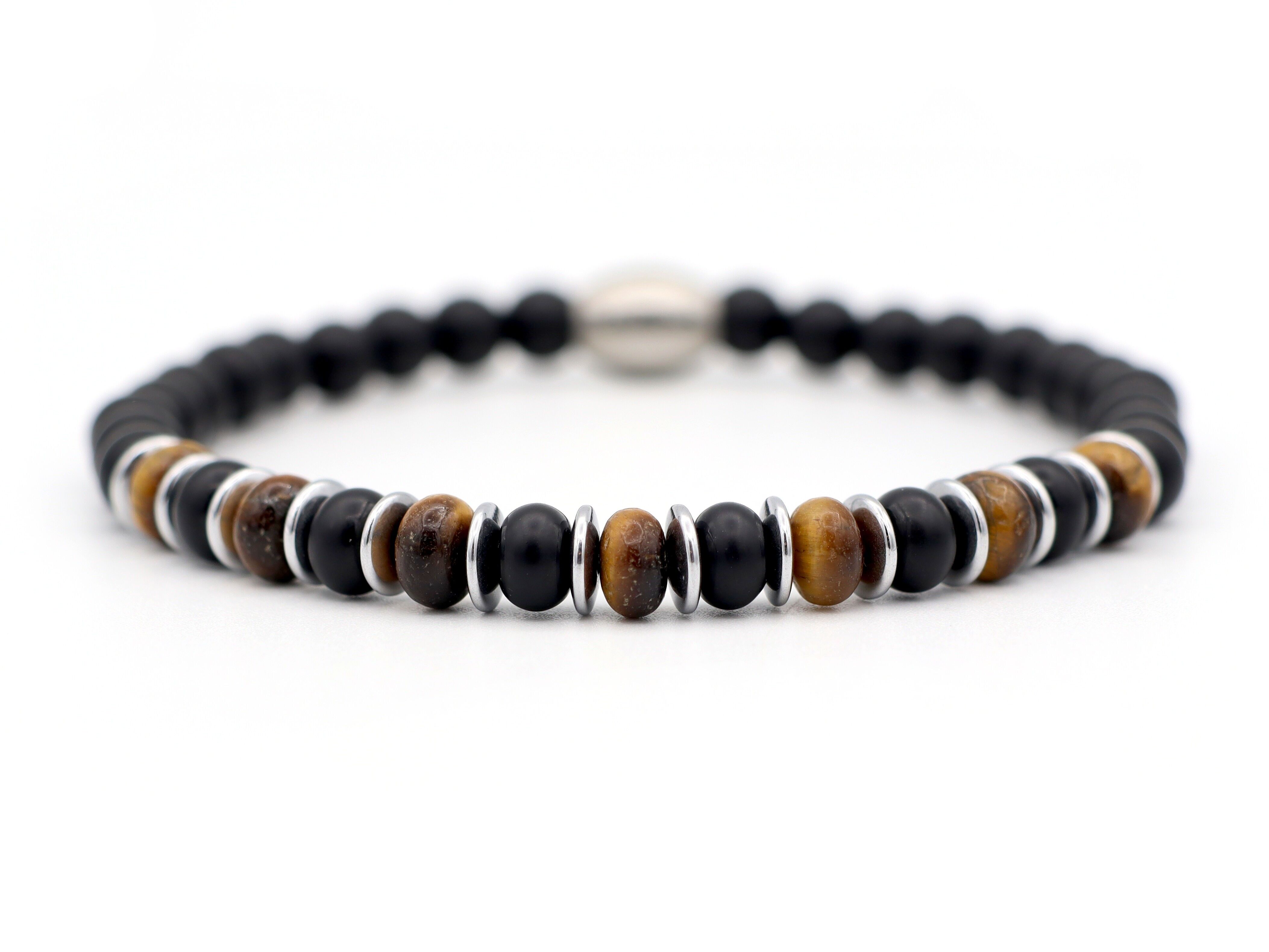 Enam Jimat Occhio di Tigre (argento o oro)