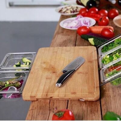Bamboo cutting board with collection trays