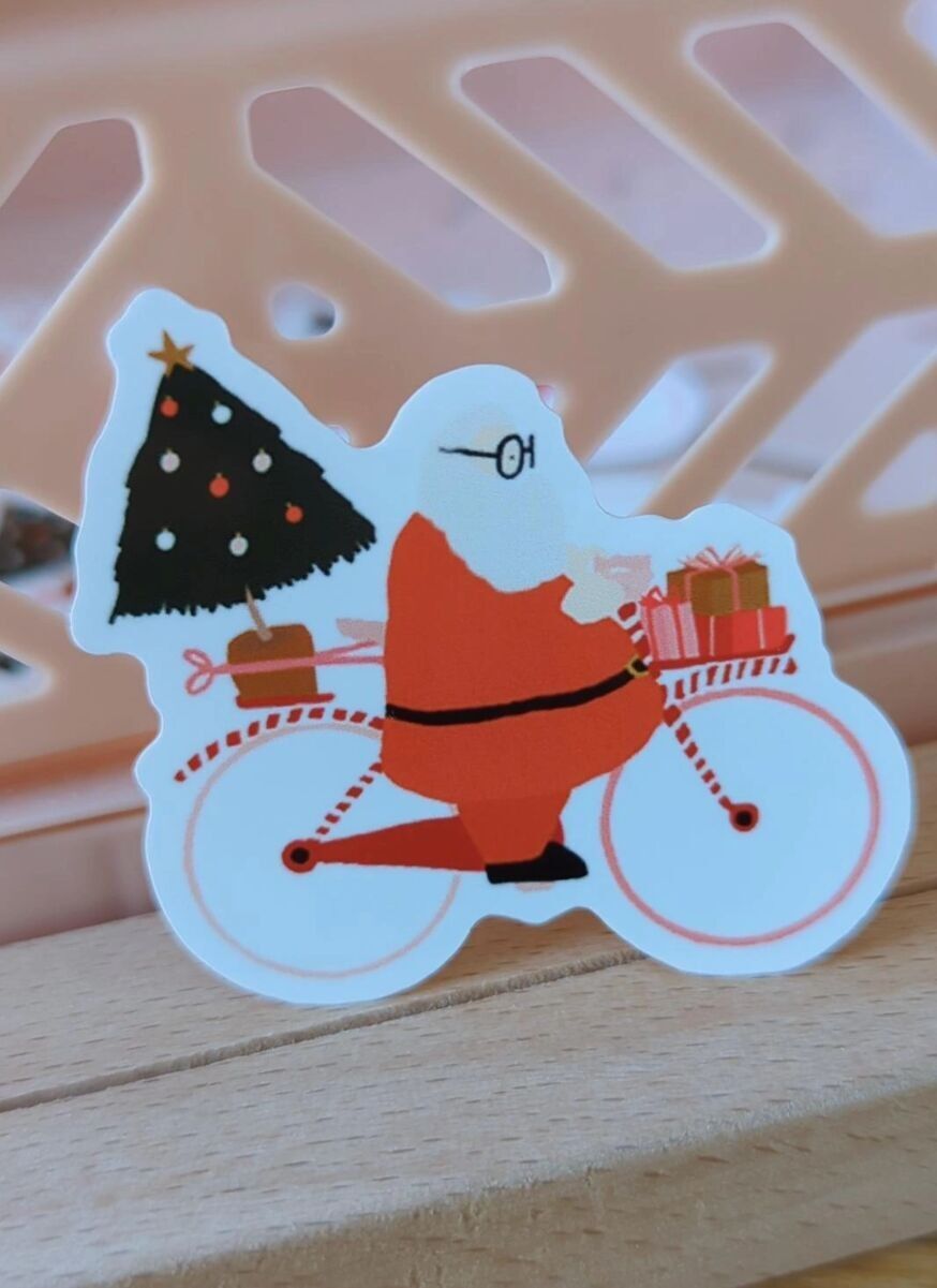 Weihnachtsmann auf einem Fahrrad Aufkleber