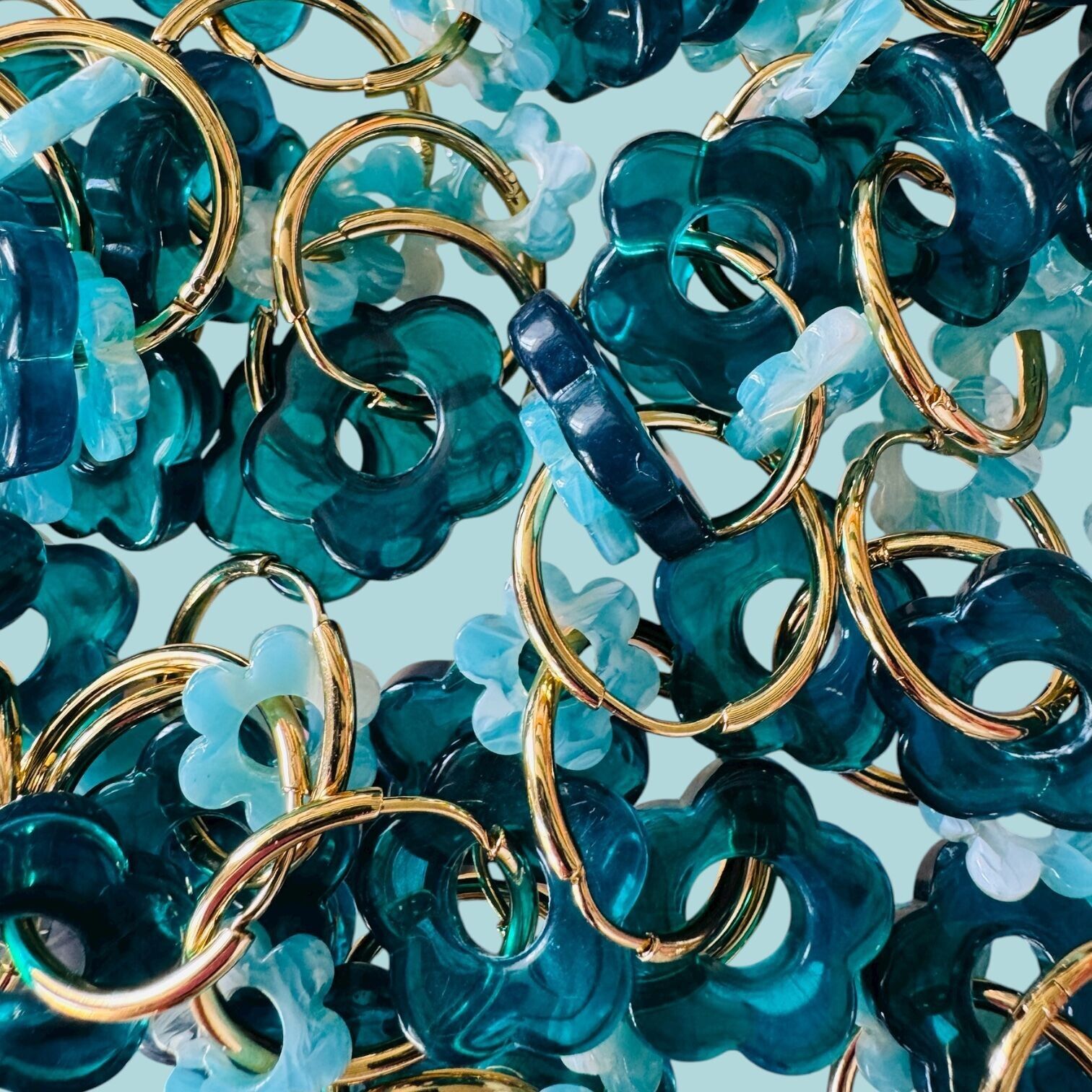 6 orecchini a cerchio con fiori