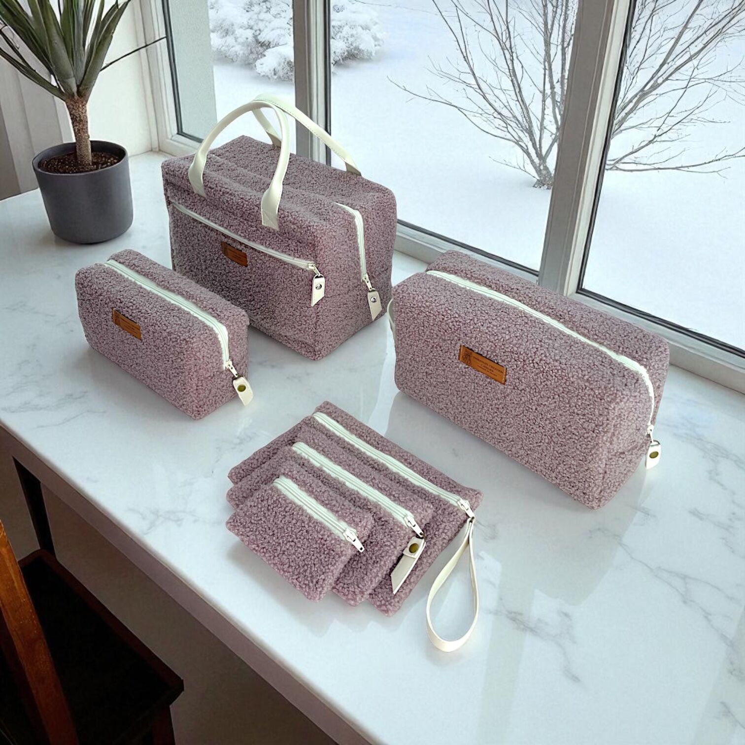 Confezione da 3 pochette, 2 astucci e 1 beauty case, rosa "Bouclette"