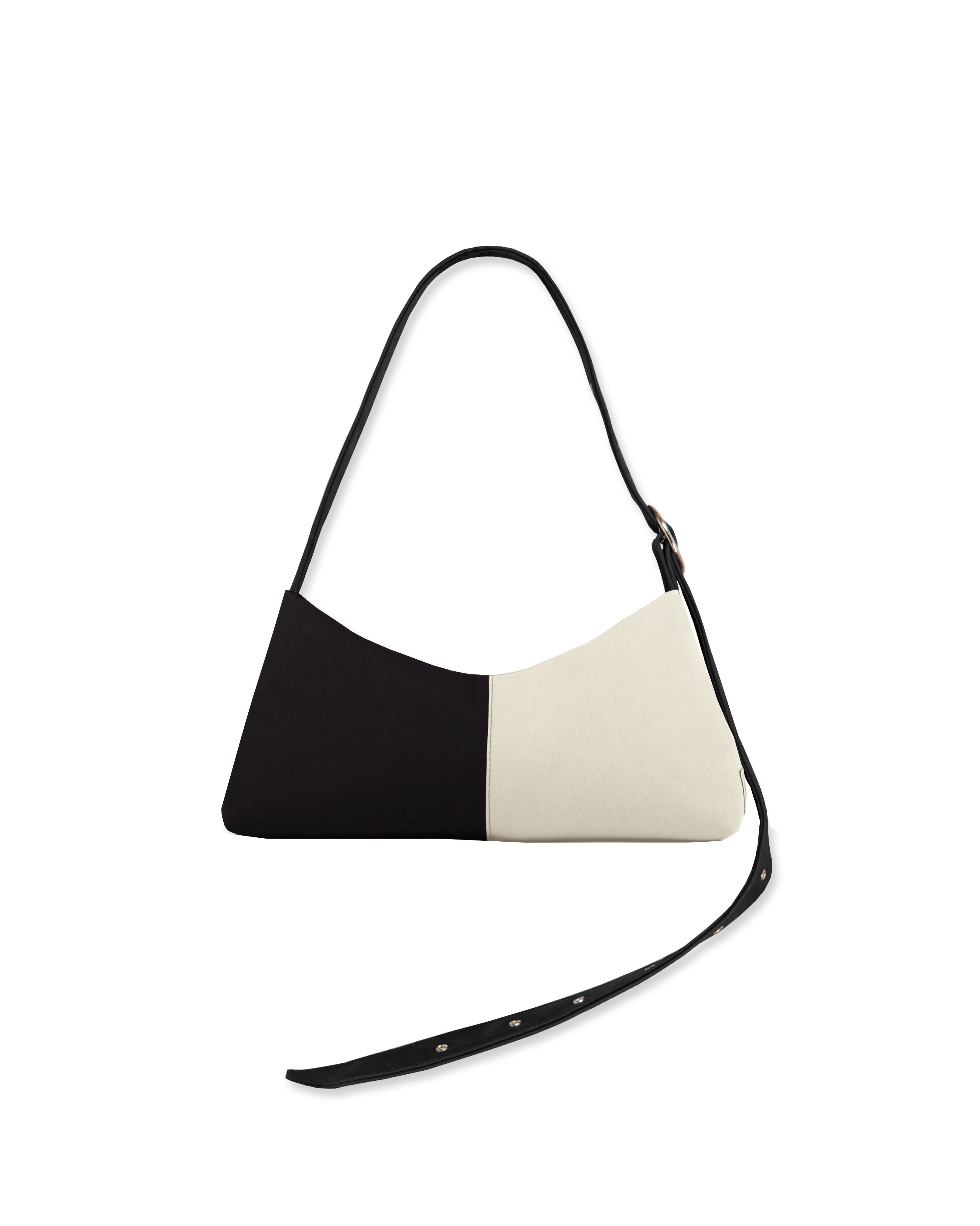 Bolso baguette blanco y negro con correa ajustable y hebilla plateada – Gala