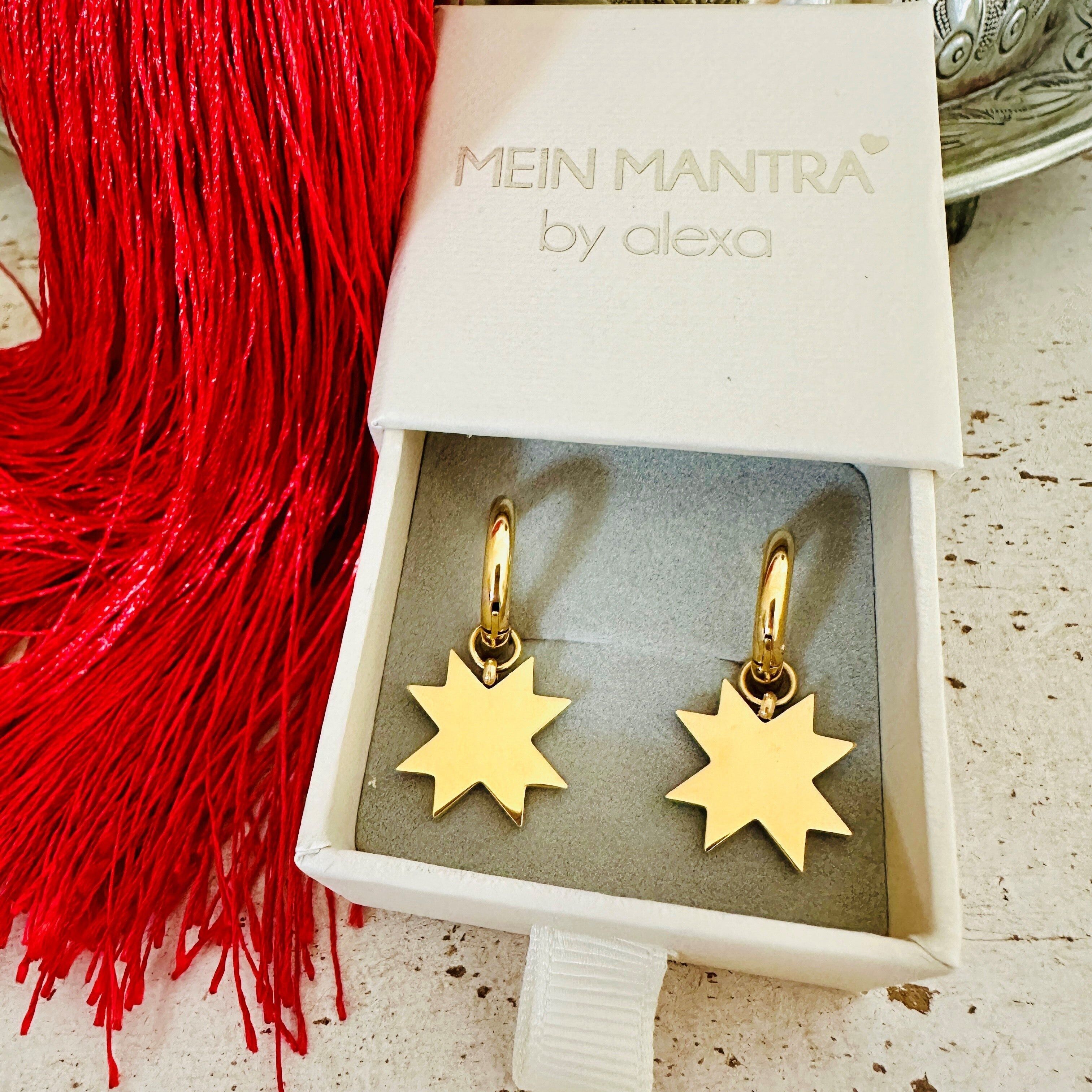 Boucles d'oreilles créoles avec étoiles