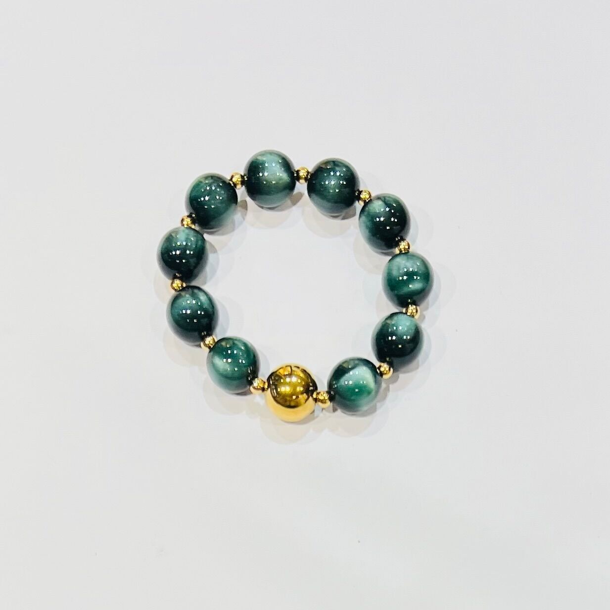 Bracciale in acciaio con perline a forma di occhio di gatto dal design minimalista