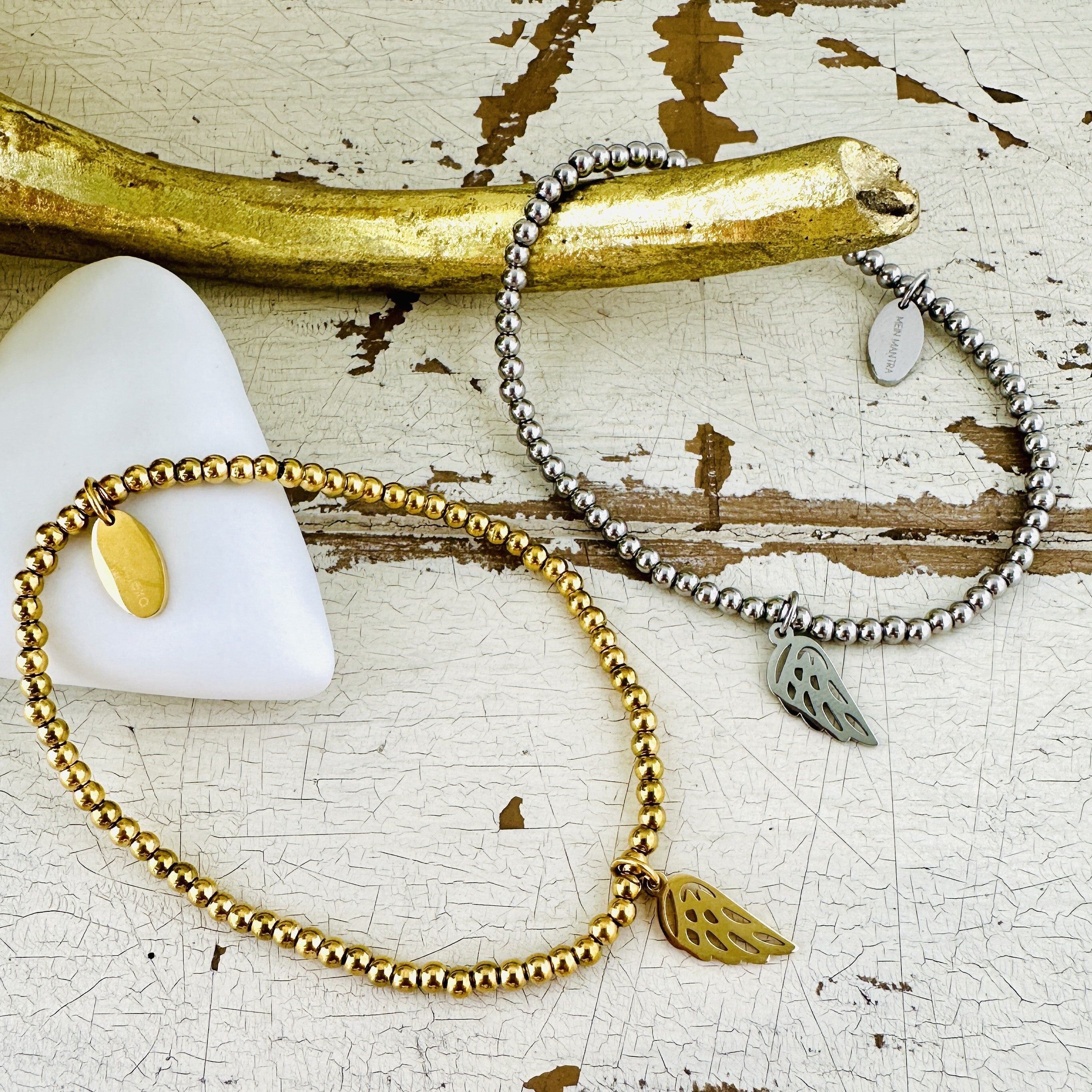 Bracelet boule avec ailes d'ange