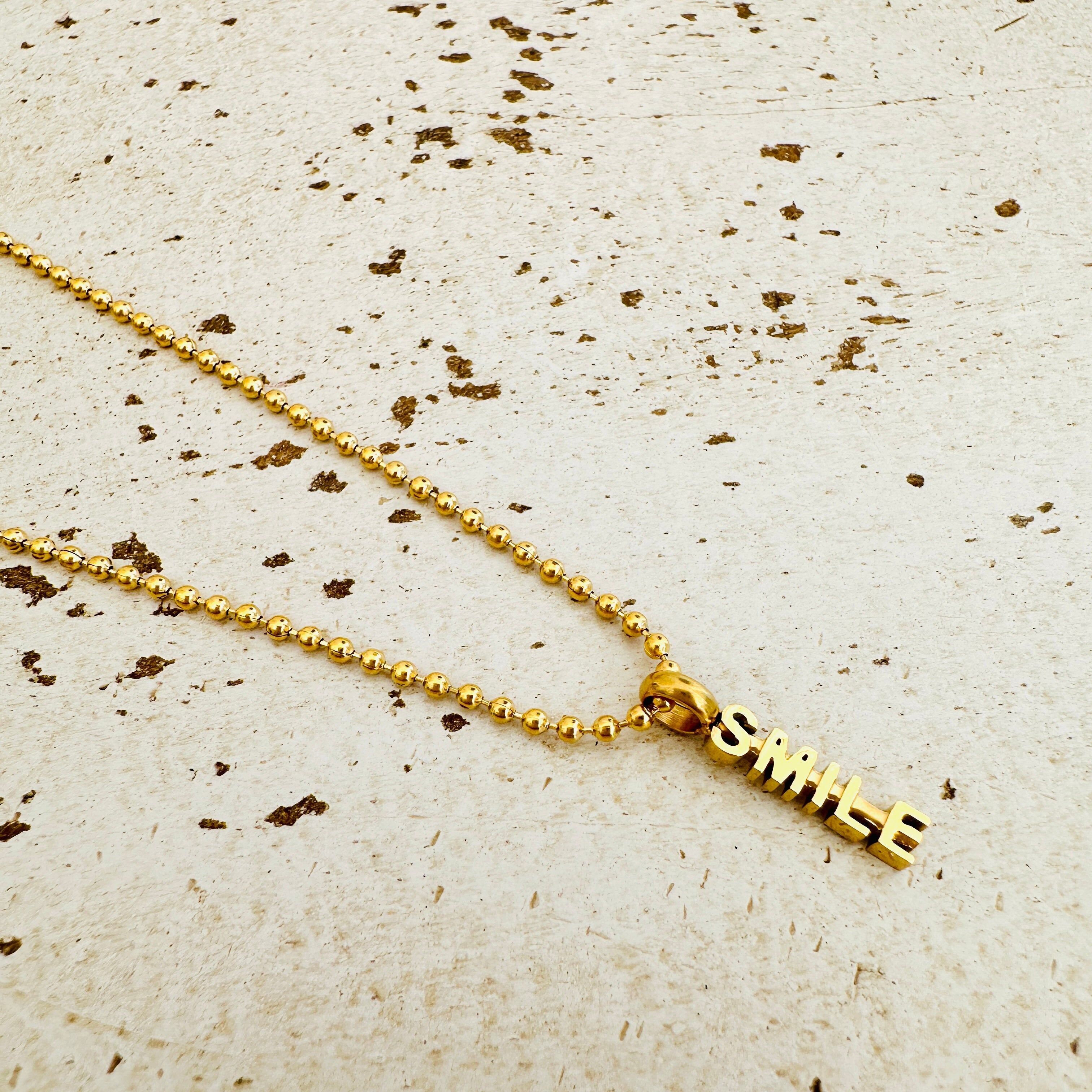 Catena a palline con ciondolo SMILE