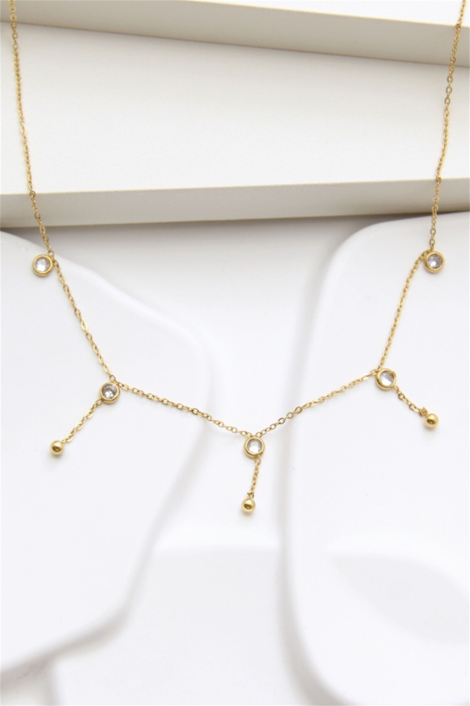 Vergoldete Edelstahlkette mit Quasten und Zirkonia – Minimalistische Eleganz