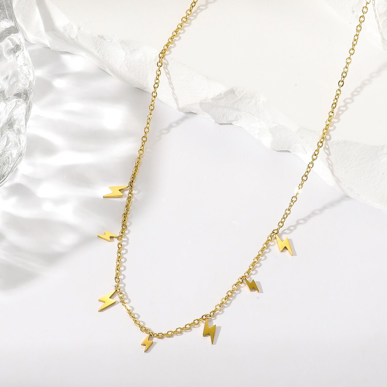 Multi lightning bolt necklace in gold