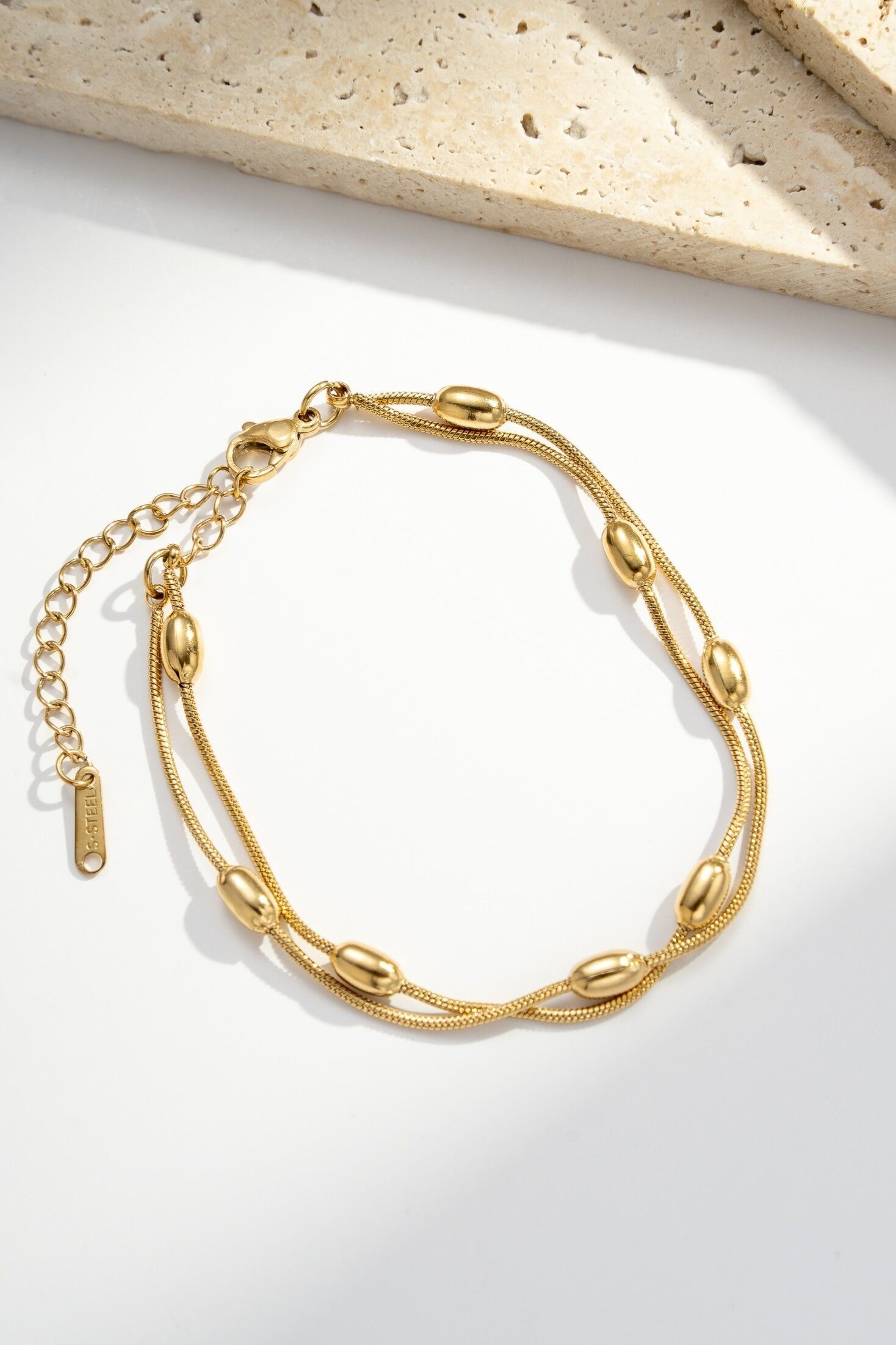 Pulsera de cadena doble con cuentas ovaladas de acero inoxidable