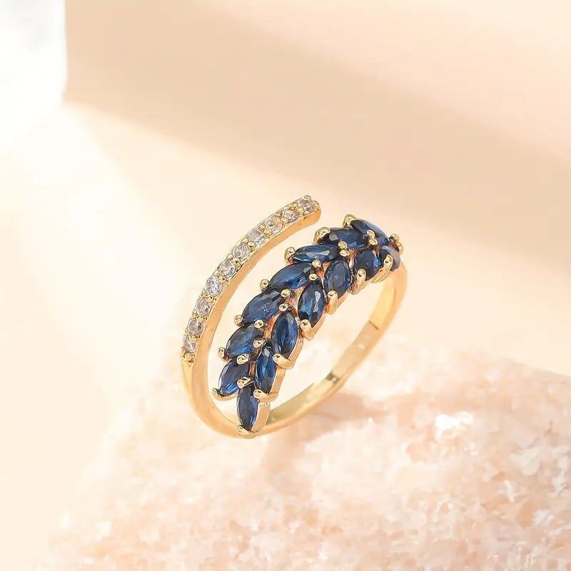 Bague manchette réglable en or et feuilles de zircone cuivrées