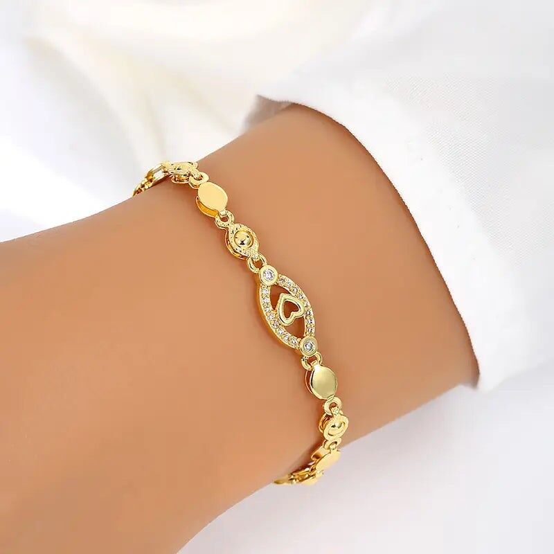 Pulsera de corazón chapada en oro con dije de hoja de circonita cúbica