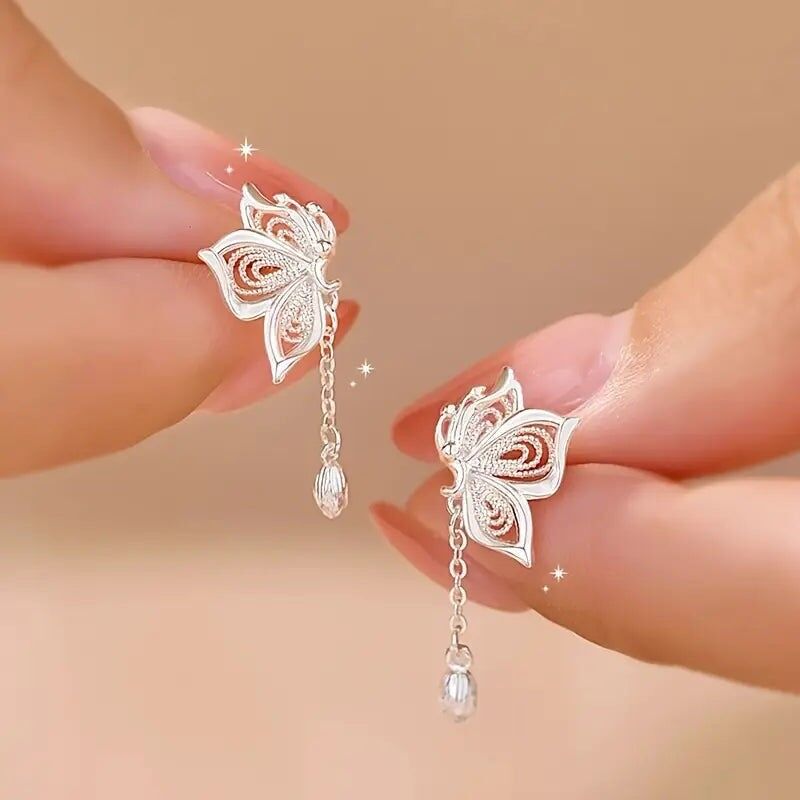 Pendientes colgantes huecos: joyería elegante para mujer