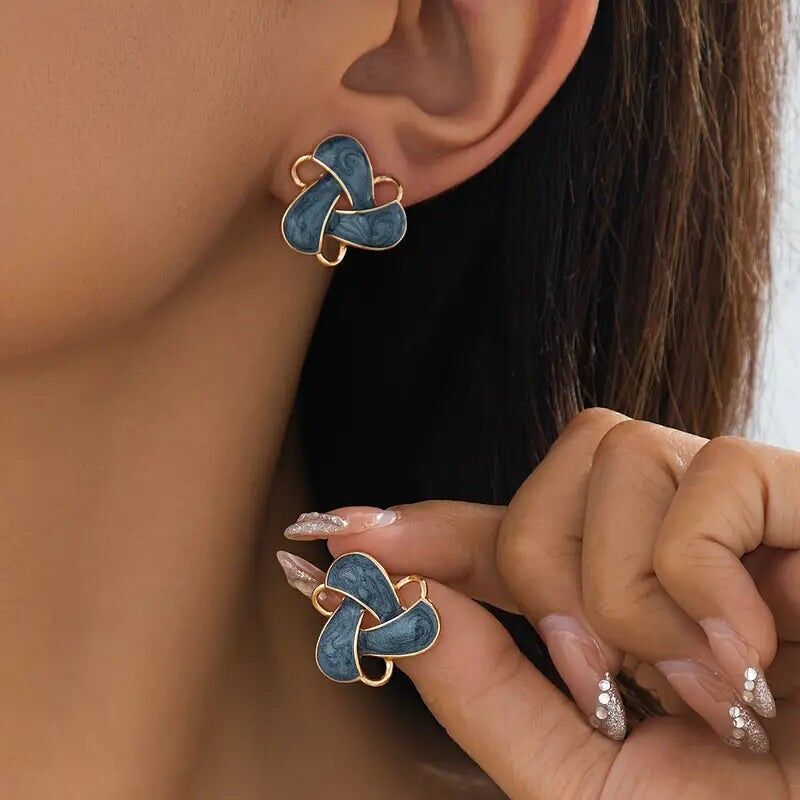 Orecchini a forma di fiore rotante - Gioielli con borchie pendenti geometriche