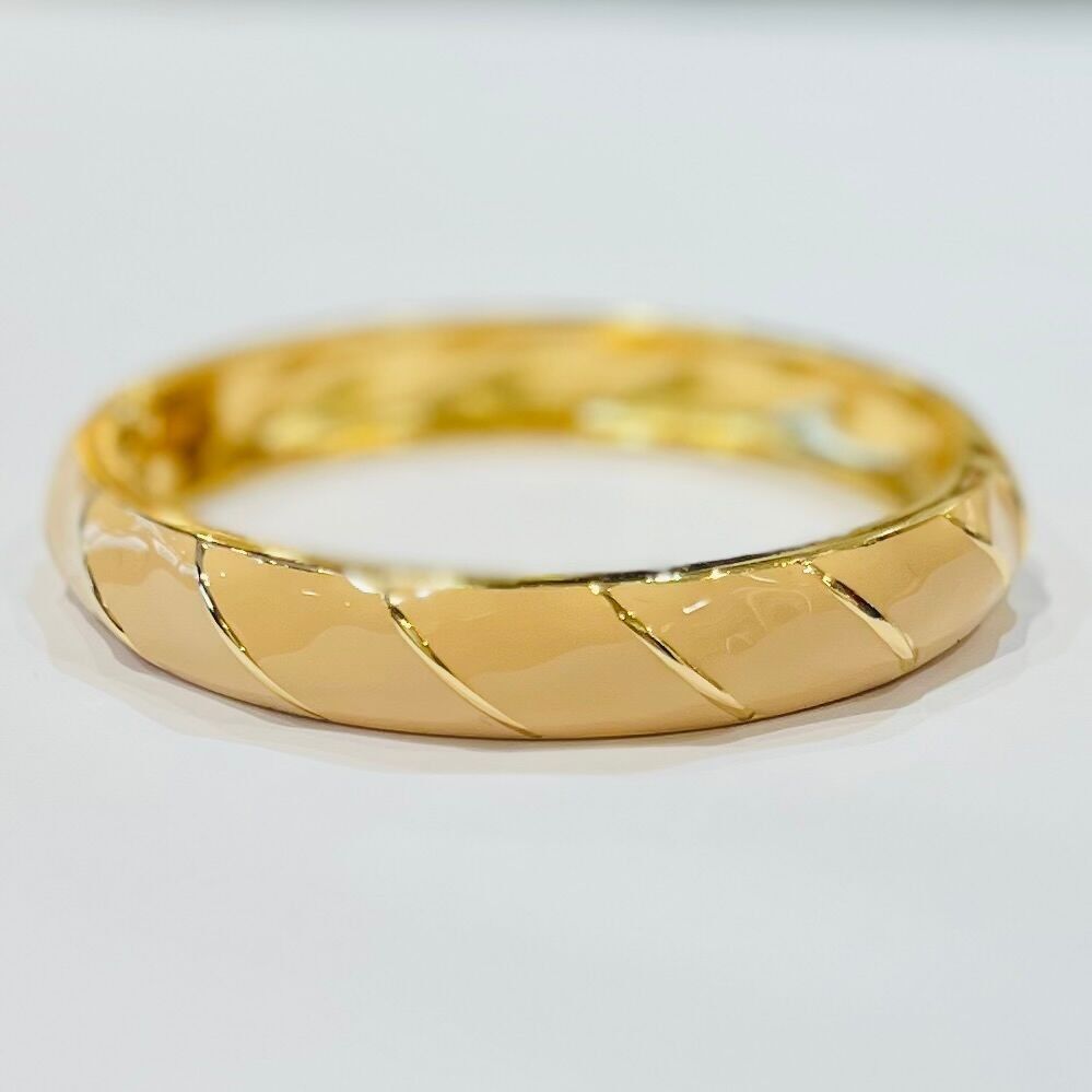 Bracciale apribile in acciaio smaltato con elegante motivo grafico a righe