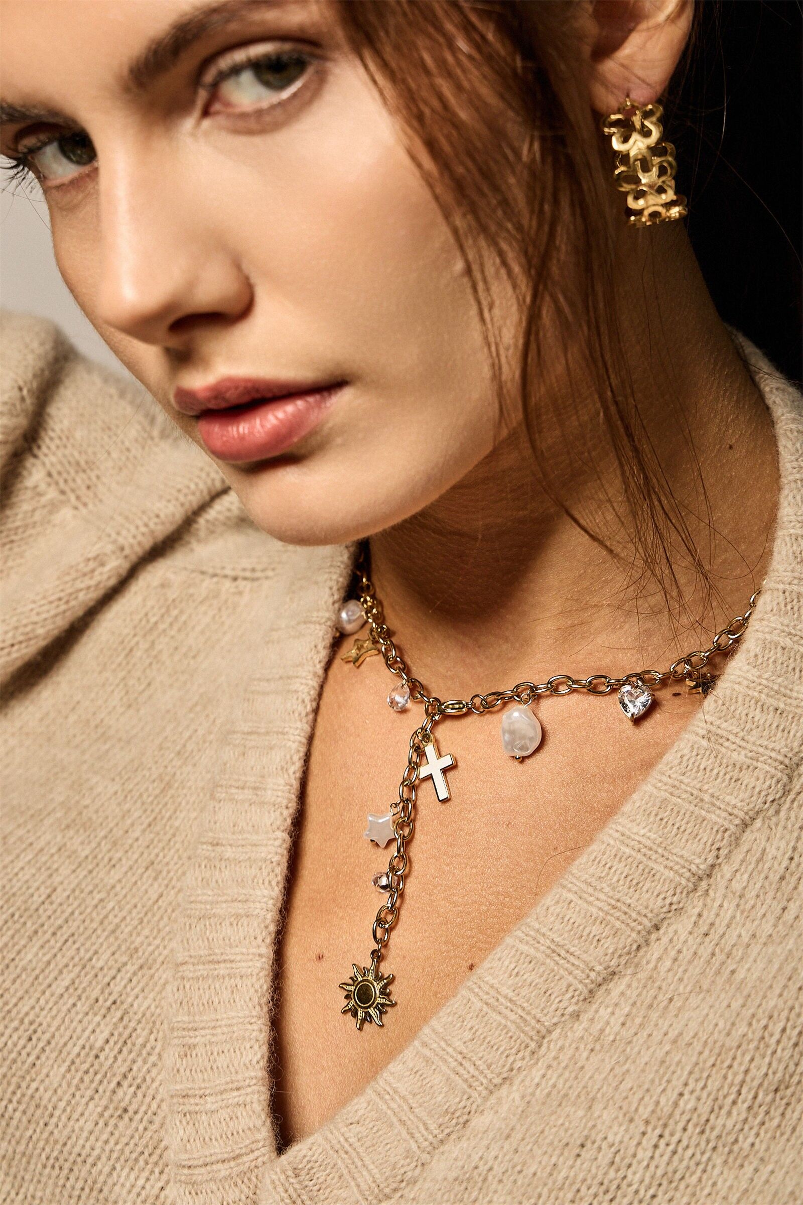 Kleeblatt-Creolen aus goldenem Edelstahl – Eleganz und Glücksbringer