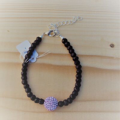 Gemstone bracelet made of black spinel with a glitter ball