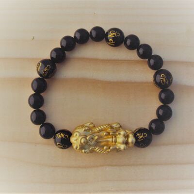 Pulsera de piedras preciosas de ónix negro y dragón dorado