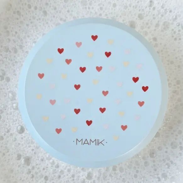 Round soap dish with integrated soap holder