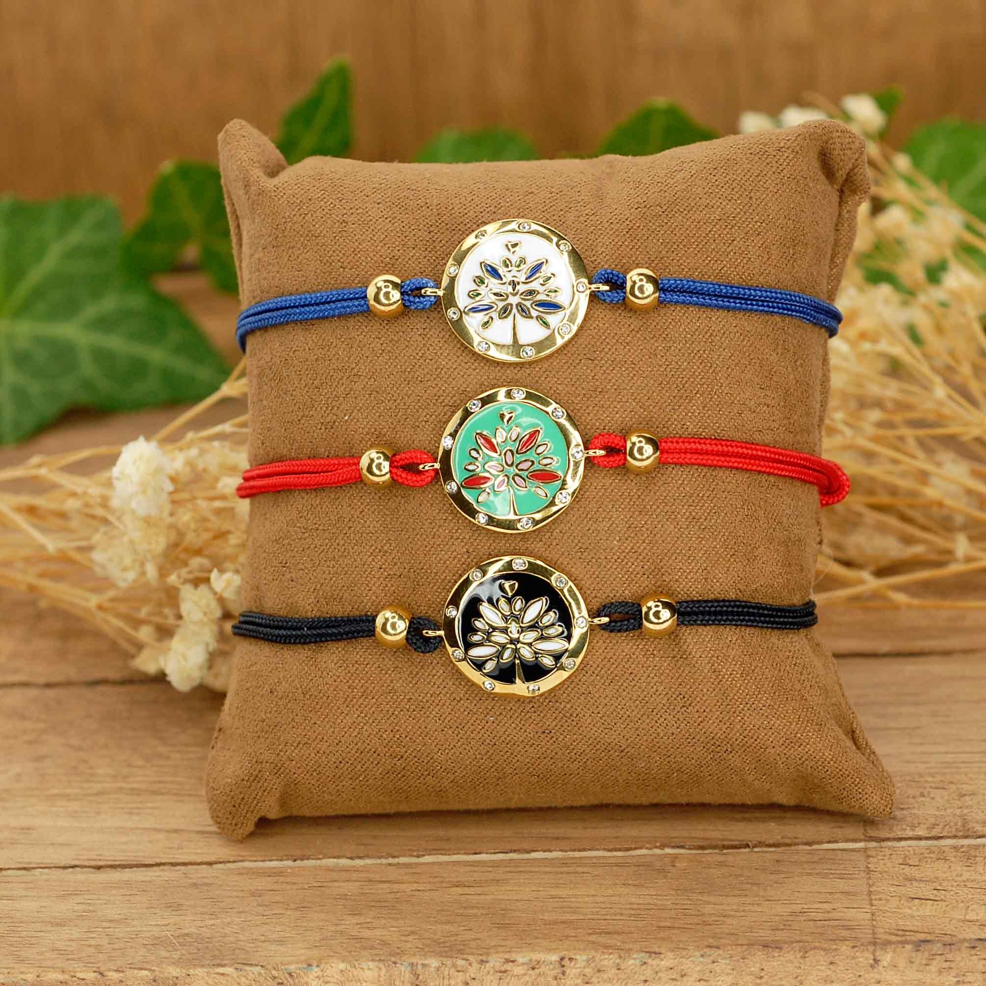 bellissimi orecchini e bracciale in acciaio smaltato.